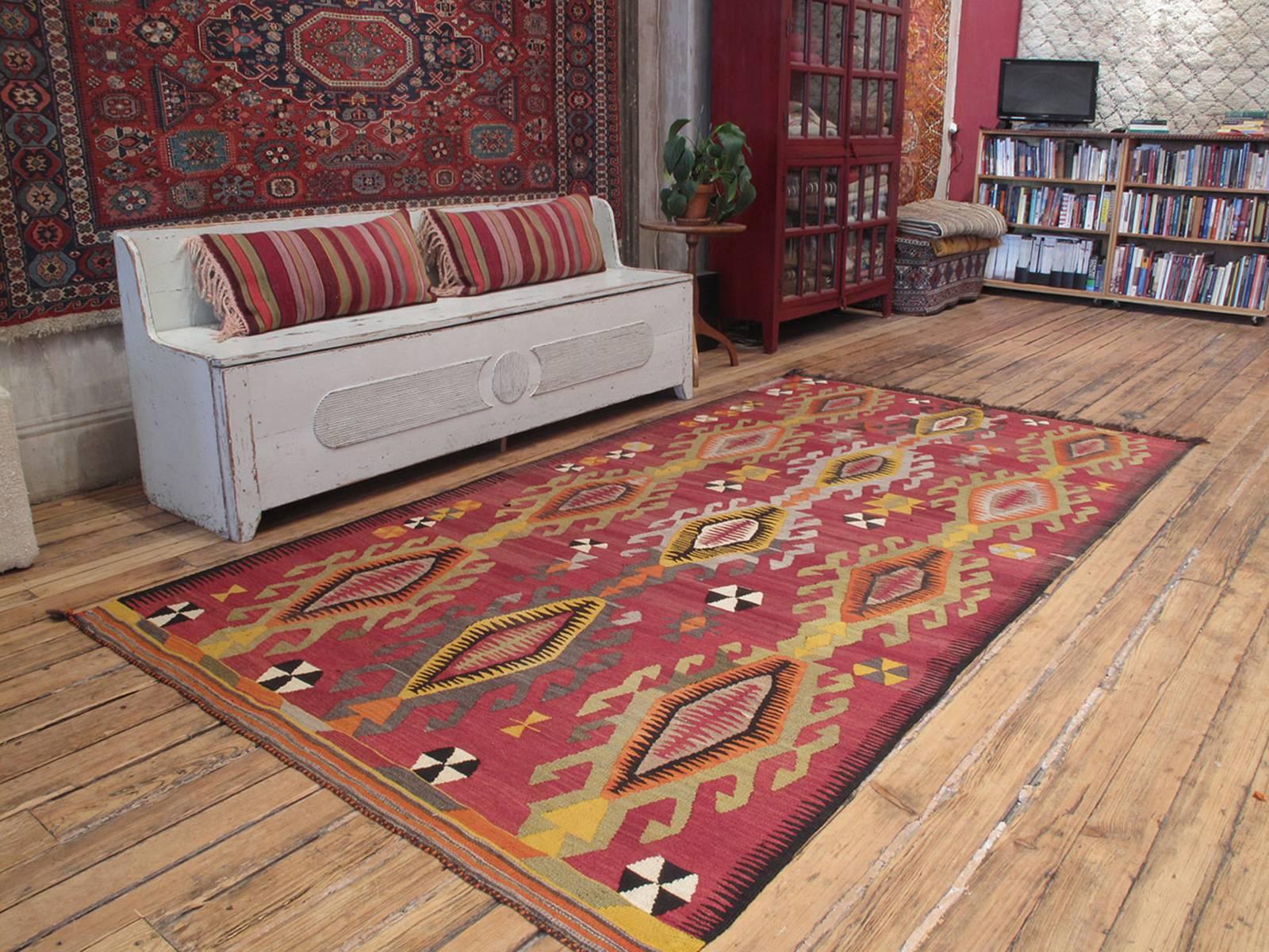 Mut Kilim rug. A great Turkish tribal Kilim rug from the region around the town of Mut in the Taurus Mountains. Rug has striking imagery and bold color palette.