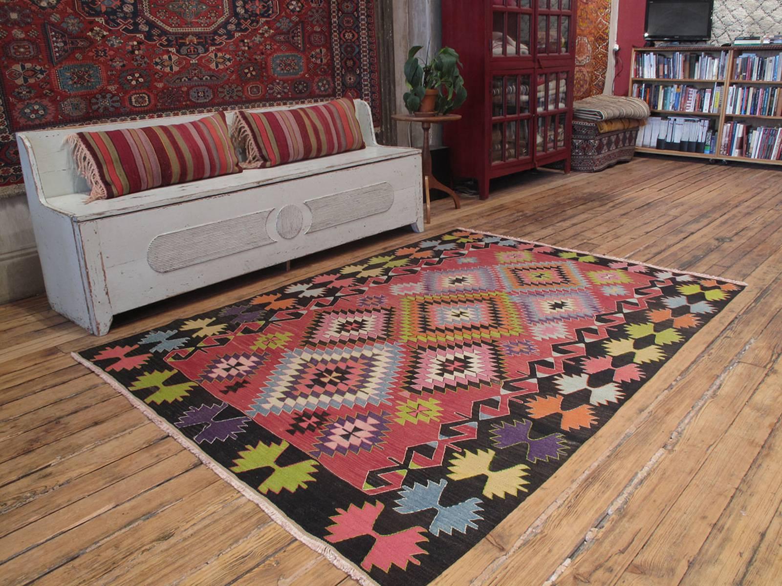 Bright Balikesir Kilim rug. A bright and cheerful tribal floor cover or rug from Western Turkey.