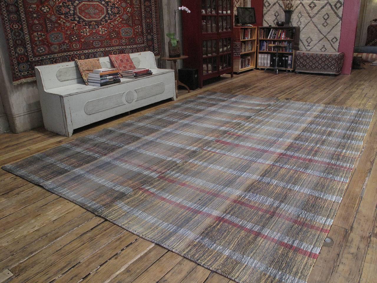 An old flat-weave from Central Turkey, woven with an ingenious mixture of cotton rag, wool and goat hair and used as a sturdy, everyday floor cover in the weaver's household. Great modern appeal with its unexpected color palette and simple