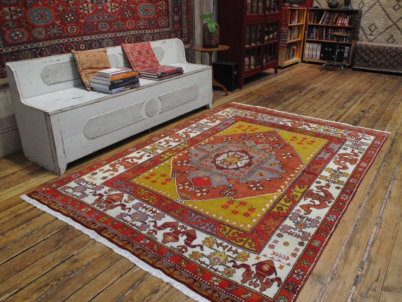 Yuntdag rug with Cloudband border. A great example of Western Anatolian weaving by tribal groups settled in the Manisa - Bergama region, attributed to the highland pastures of Yuntdag. This is one of the characteristic designs of the region