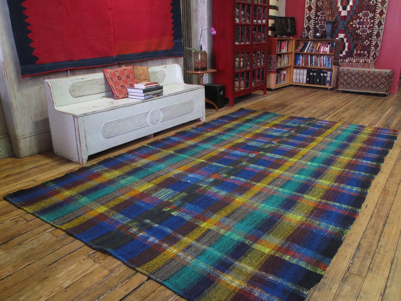Not for the faint of heart! An old flat-weave from Central Turkey, woven with an ingenious mixture of colorful cotton rag and goat hair, creating a sturdy floor cover for everyday use. We have handled many of these over the years - this is certainly