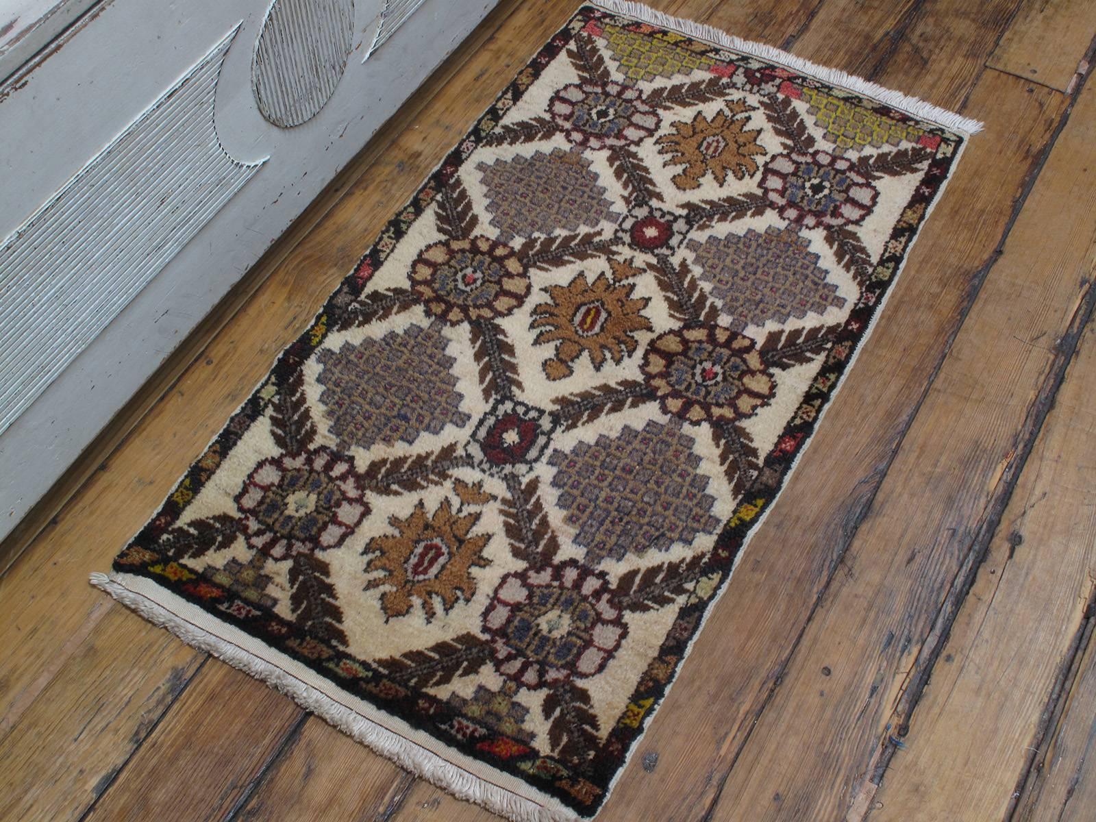 Small Turkish 'cushion cover' rug. A small weaving rug from Central Turkey, probably meant for use as a cushion cover, an essential furnishing element in traditional village homes. A lovely example with a very unusual design.