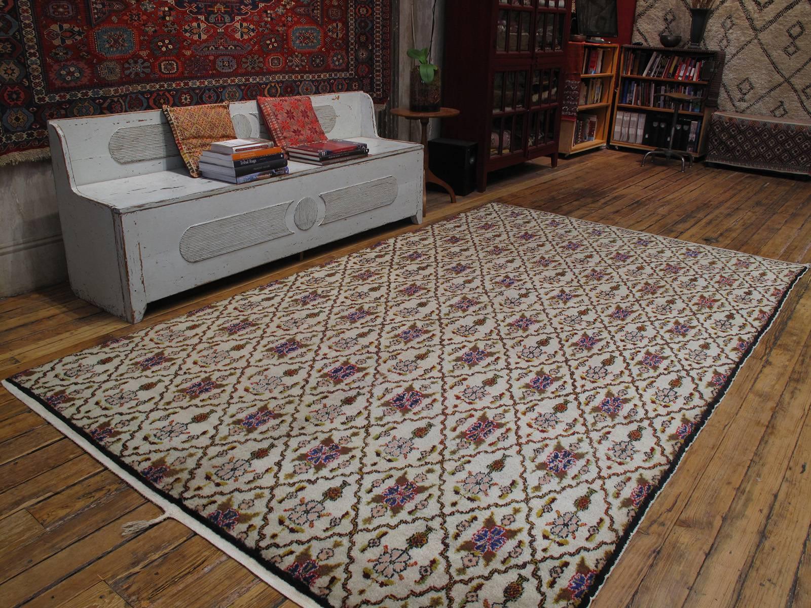 Karaman rug. A charming village rug from Central Turkey with stylized flowers arranged in a grid pattern. Quite large for this type of rug with excellent quality wool.