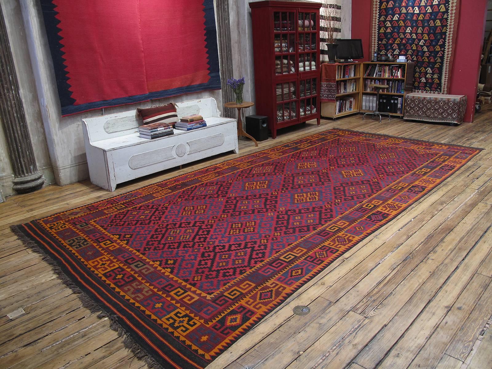 A large, brightly colored tribal kilim from Northern Afghanistan - a very high quality example.