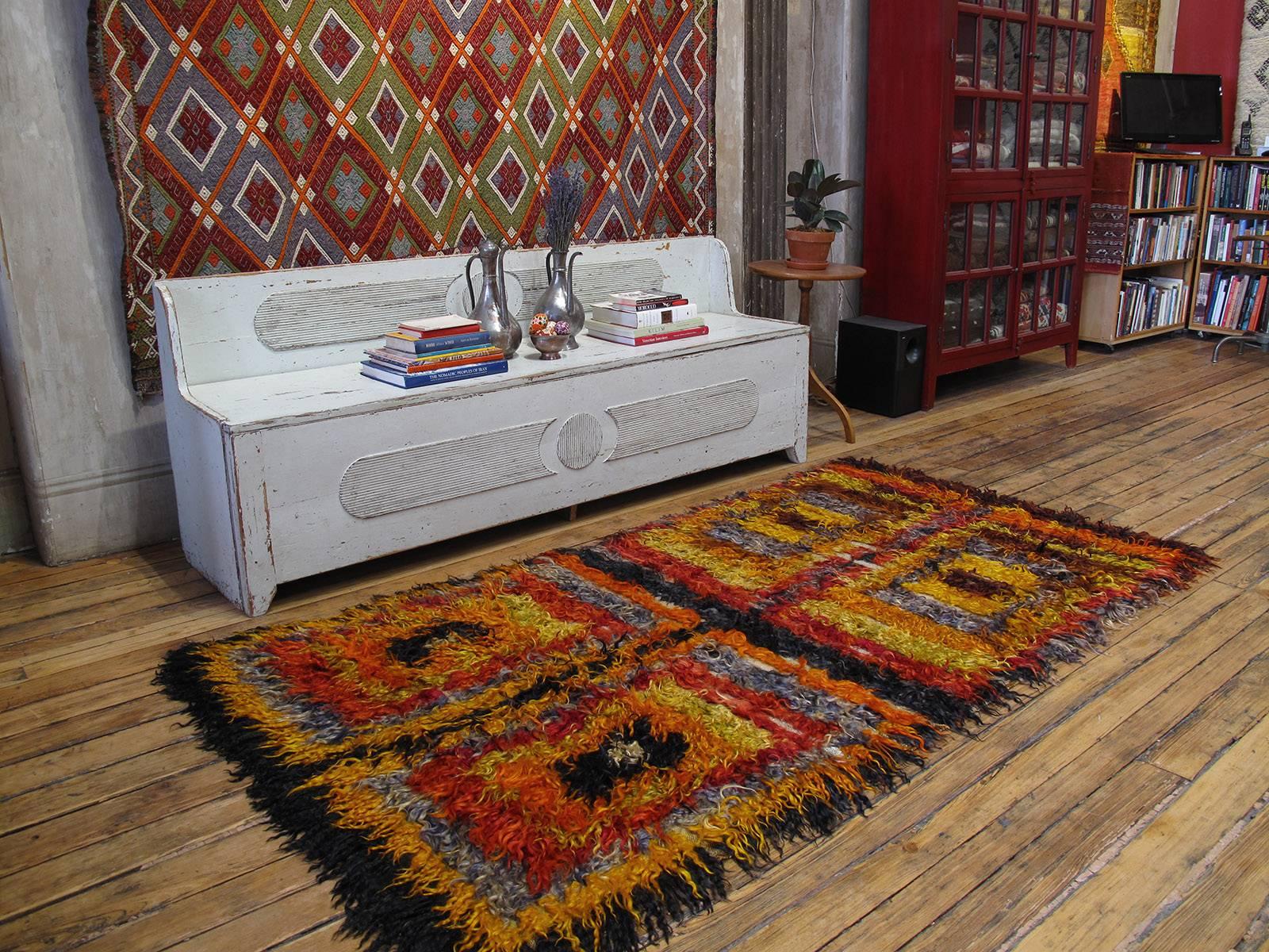 Four Squares, Angora Tulu rug. An old tribal rug from West Central Turkey, coarsely woven with long strands of colorful angora goat hair (mohair). Such rugs were used as beds, blankets and wall covers to provide warmth and comfort in village homes.