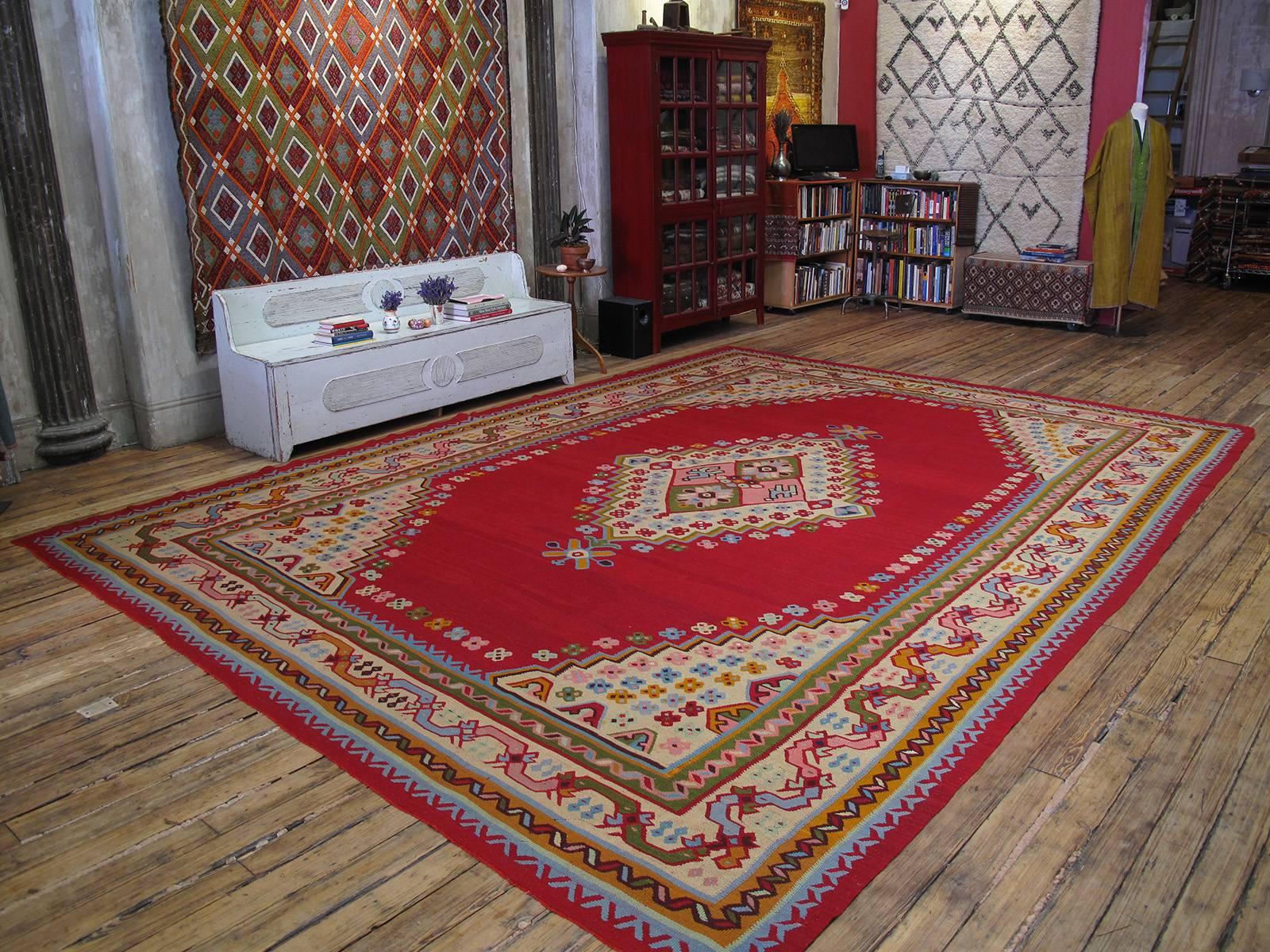 Fantastic Antique Oushak Kilim rug. An impressive antique Turkish Kilim rug of large size, woven in the Oushak region of Western Turkey. In near perfect state of preservation with brilliant colors, this Kilim is contemporary with the many antique