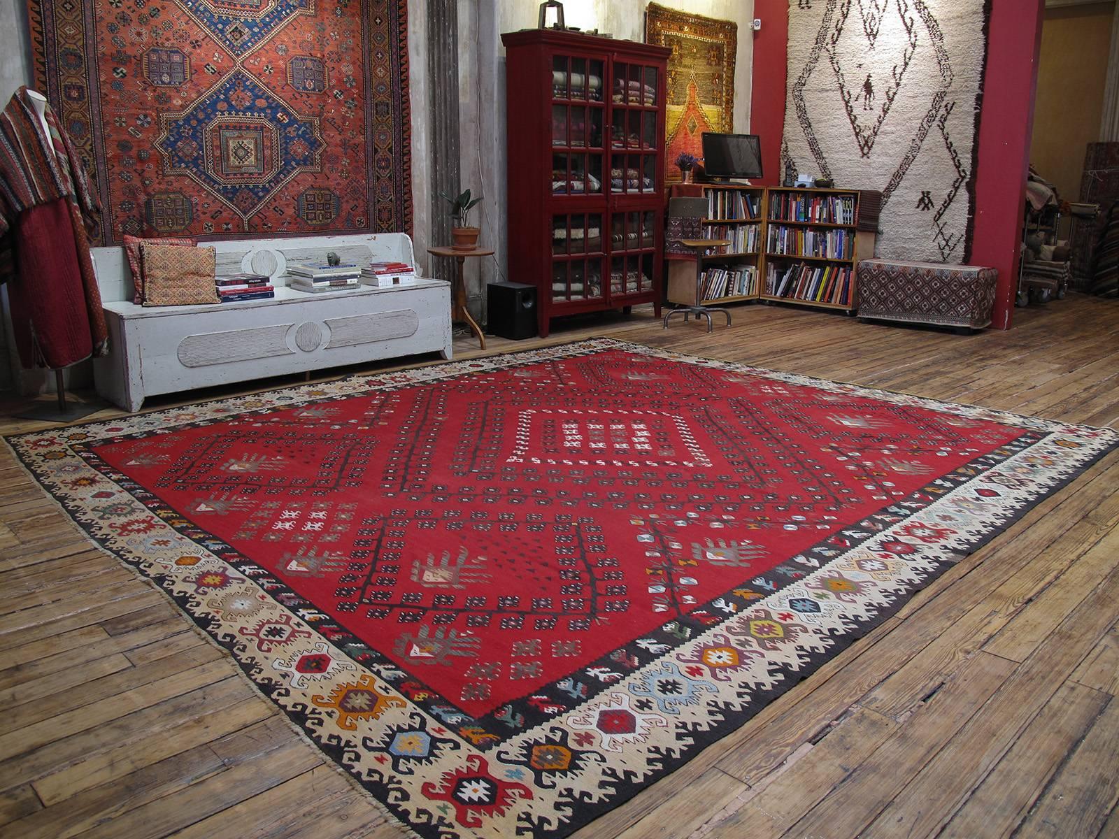 A great Kilim in one of the classical designs of this region, once part of the Ottoman Empire. A generation younger than the antique Sarkoy, this is still a very high quality example with wonderful colors, patina and nearly square proportions. It is