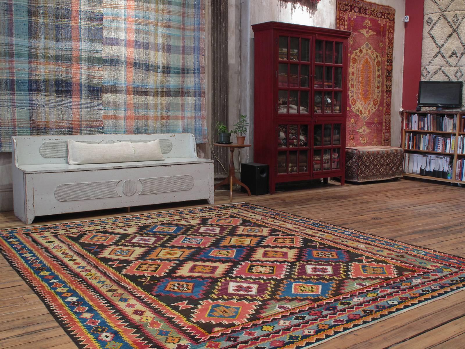 Large Azeri Kilim rug. An unusually large and very sturdy flat-weave rug from Azerbaijan of relatively recent vintage, perhaps circa 1970s, woven in the style of old Kuba kilims, although the old ones are usually narrower and longer. The wool and