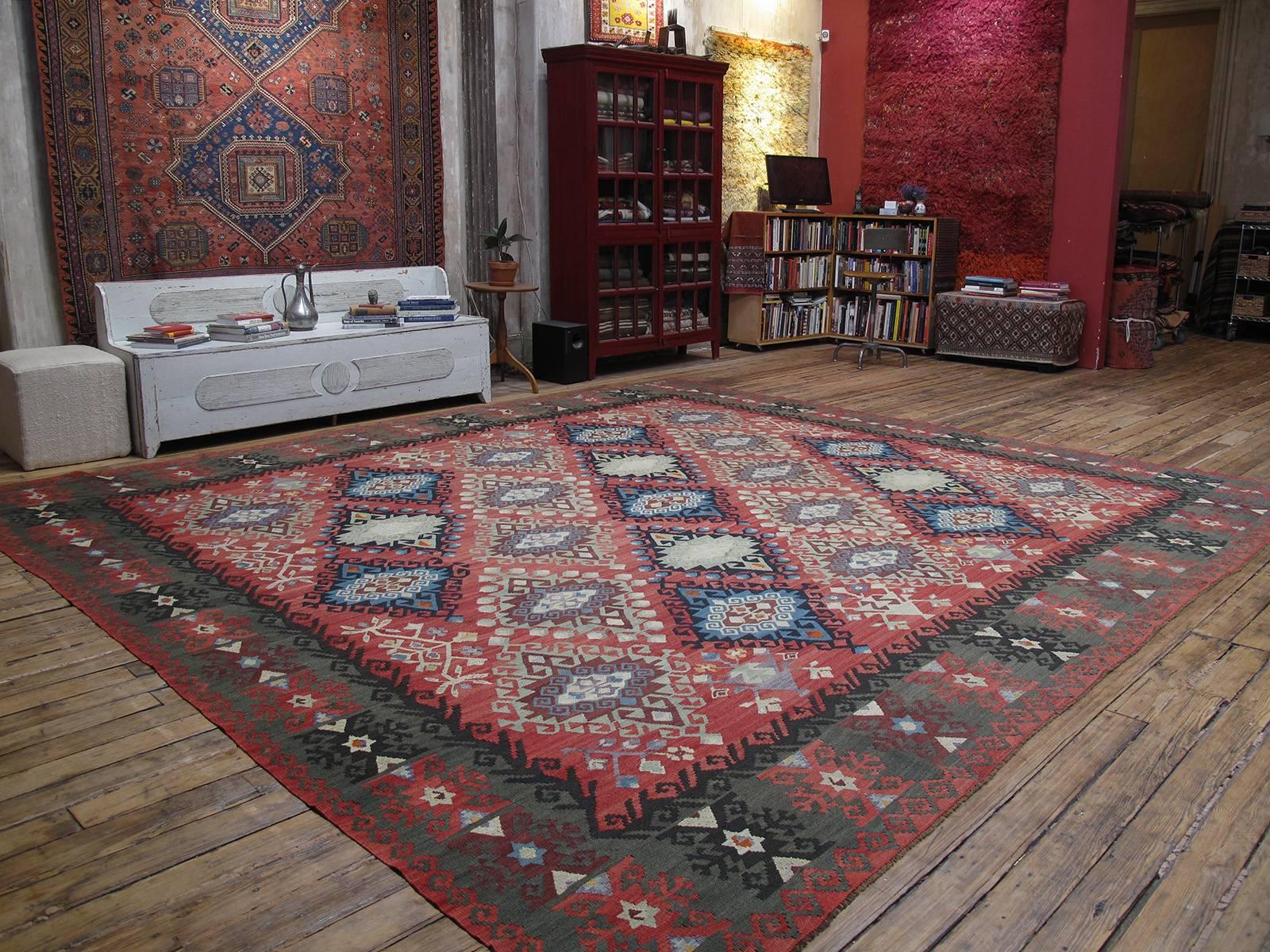 A beautiful old Kilim from the Balkans, possibly Bulgaria, of large proportions, featuring a variety of well-known Turkish Kilim motifs, in an appealing color palette. The weaving traditions in this part of Europe show the influence of the centuries