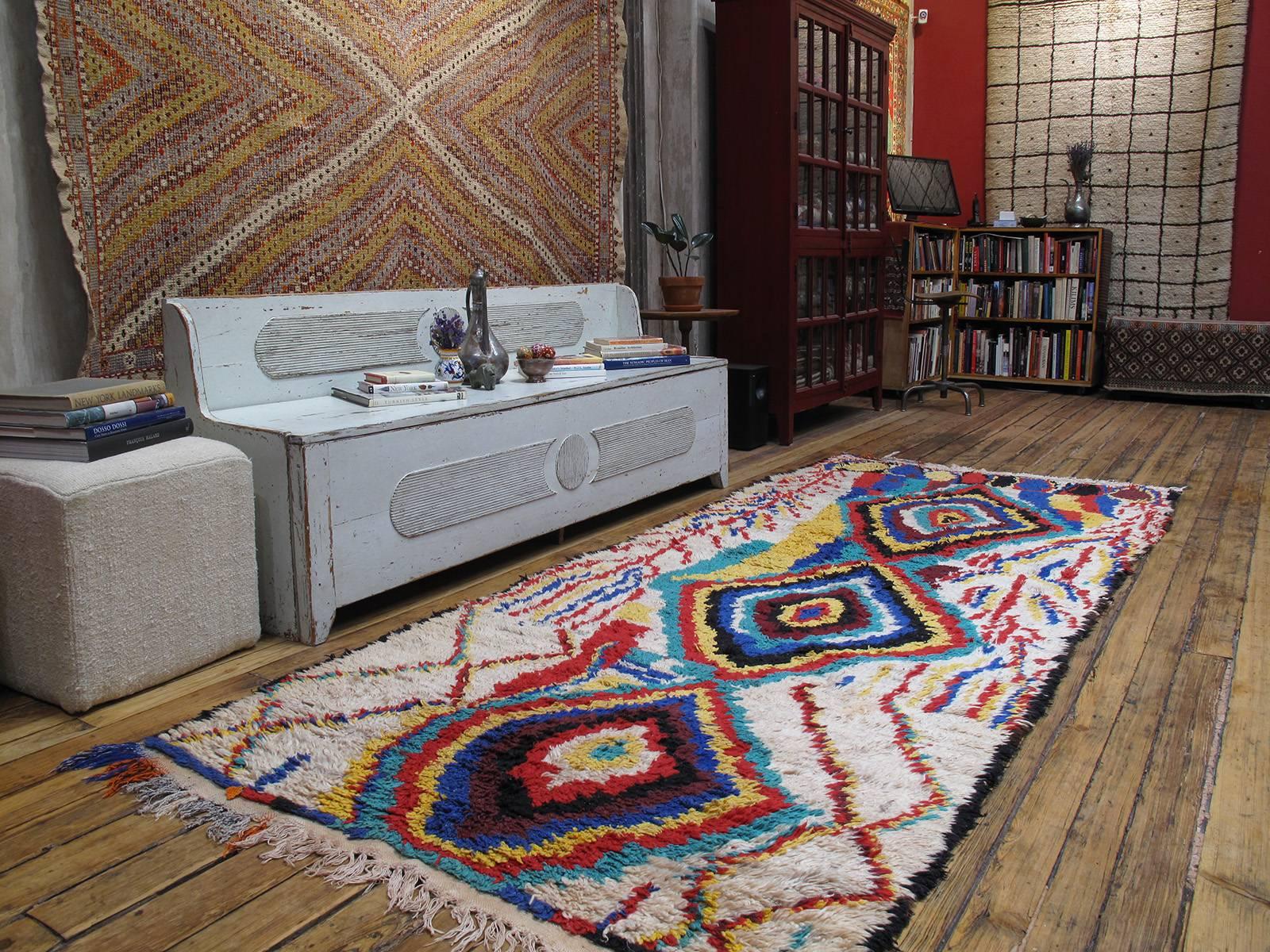 A striking Moroccan Berber rug from the Azilal province in the Central High Atlas Mountains with a bold design, vibrant colors and larger-than-usual size.

The rugs of this remote region have remained a relative secret until recently. The area
