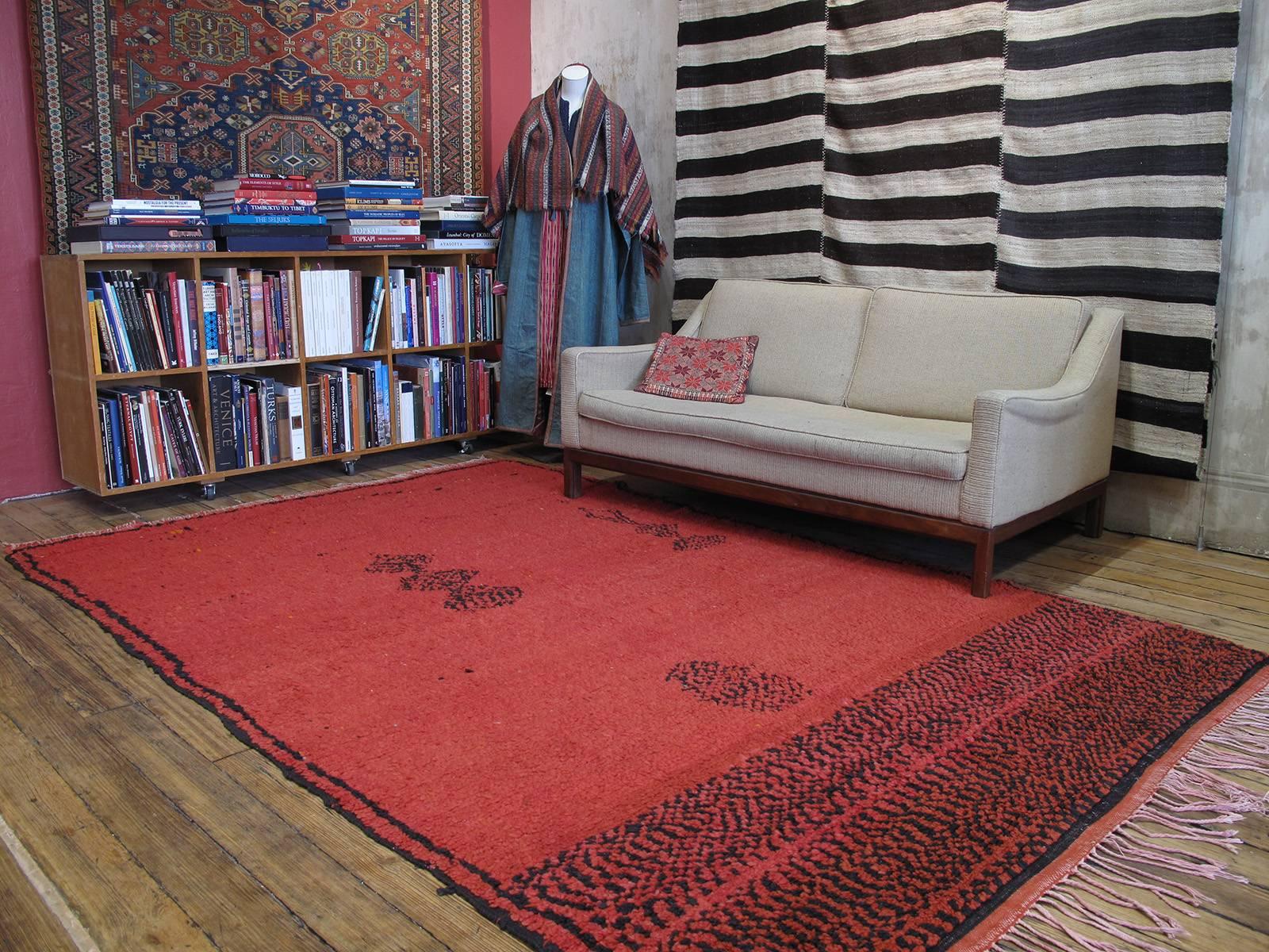Boujad Moroccan rug. An old Berber rug from the vicinity of Boujad in Central Morocco, featuring a simple, whimsical design.
