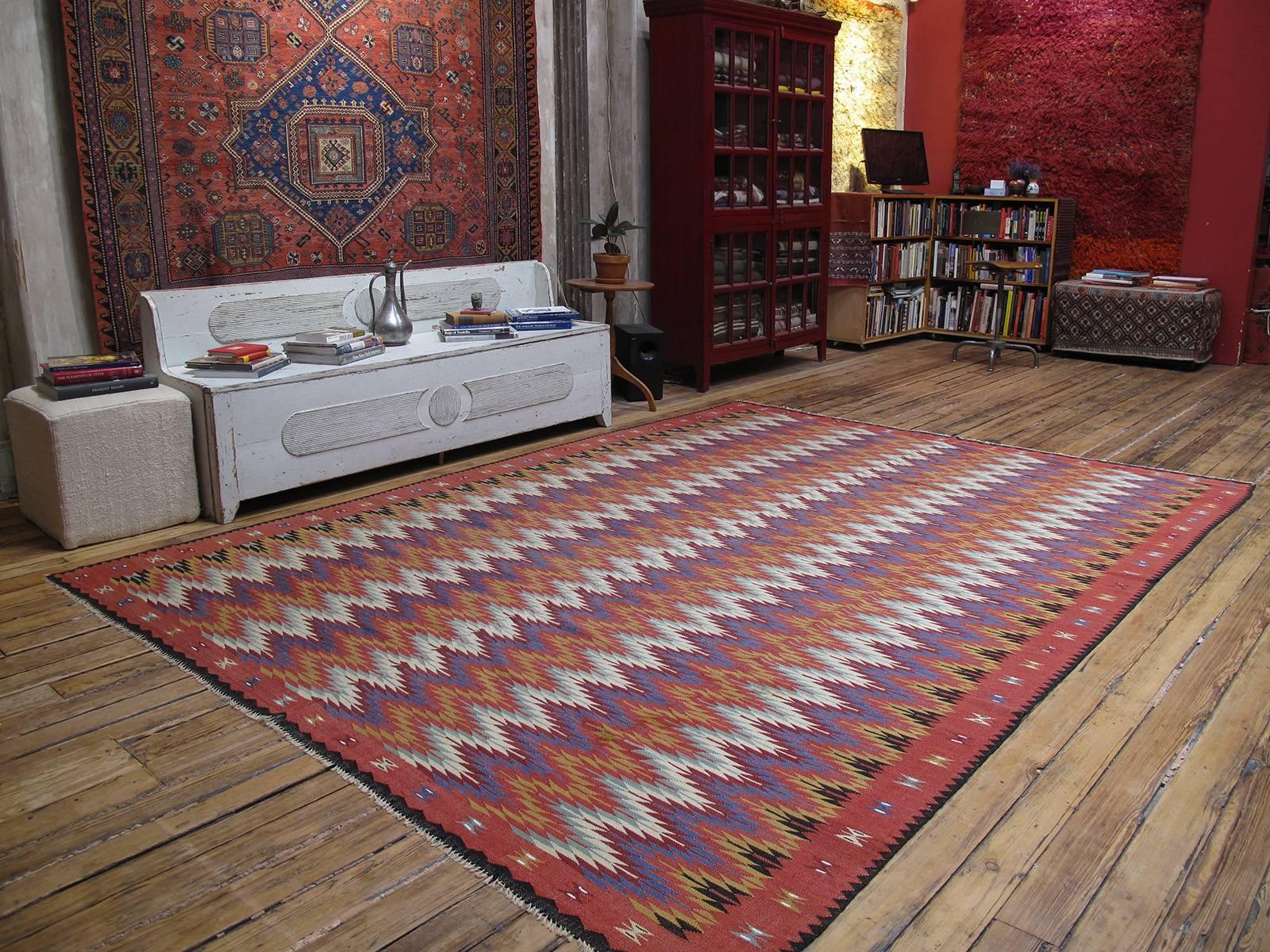 A large format Balkan Kilim from Serbia-Bulgaria border region with an unusual design.