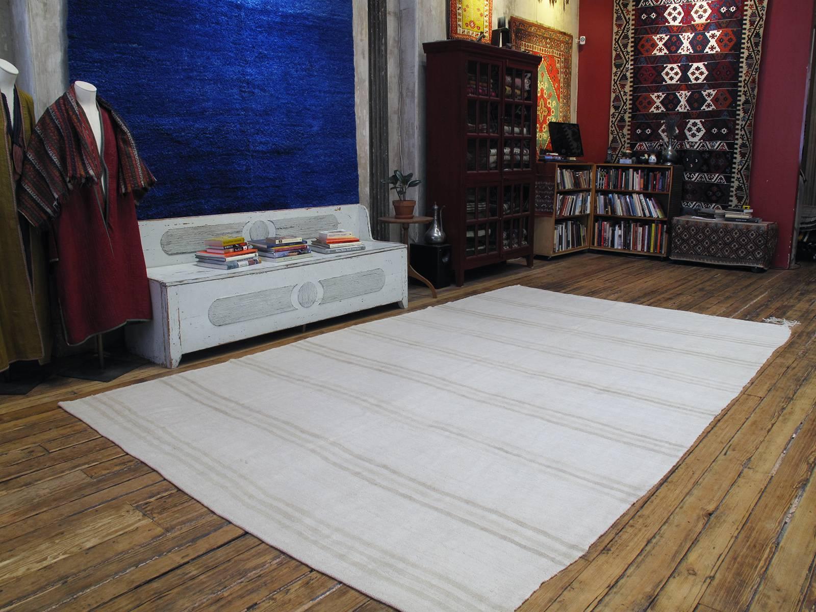 A simple, large format flat-weave from Central Turkey, woven entirely with jute. These Kilims were intended for use in the fields during harvest time, to dry grains and fruits in the sun, acquiring a wonderful patina in the process. Wonderful