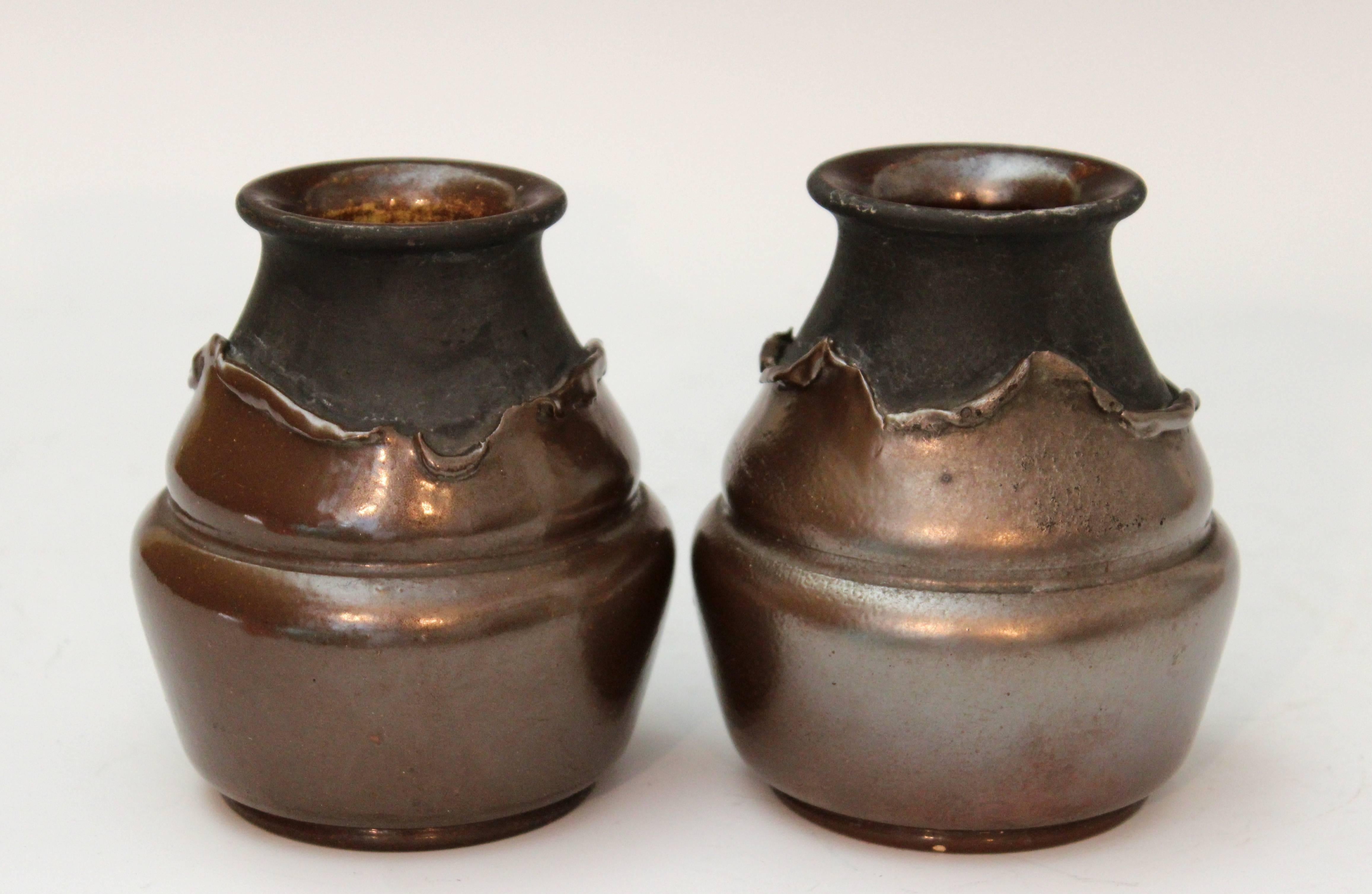 Pair of antique hand-turned Bretby Arts and Crafts vases cleverly glazed to appear as if copper cladding is peeling away from the body, circa 1900. 4 1/2