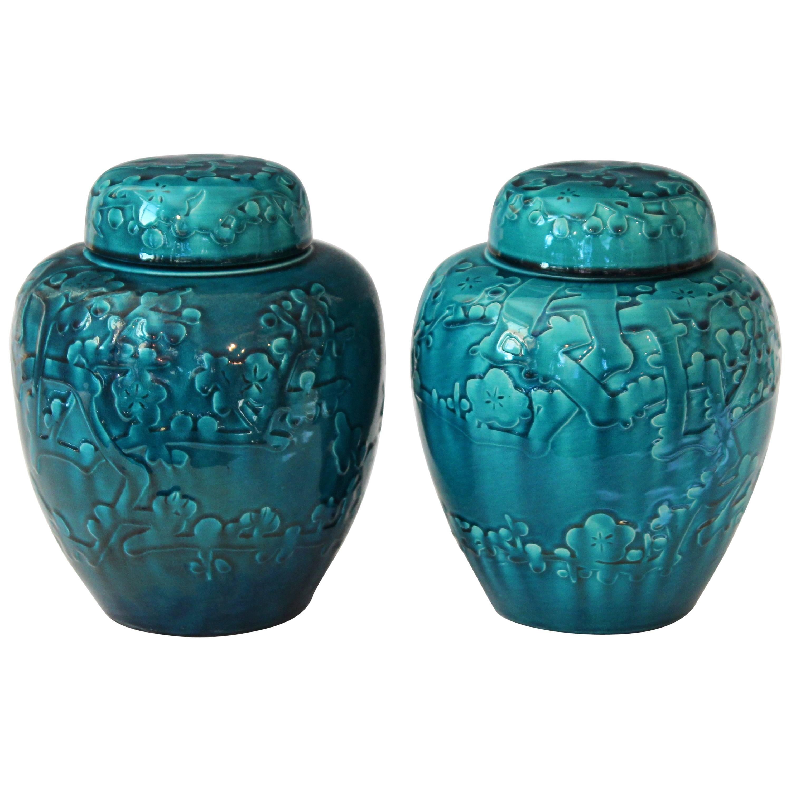Pair of Turquoise Awaji Pottery Ginger Jars, Covers Applied and Incised Prunus