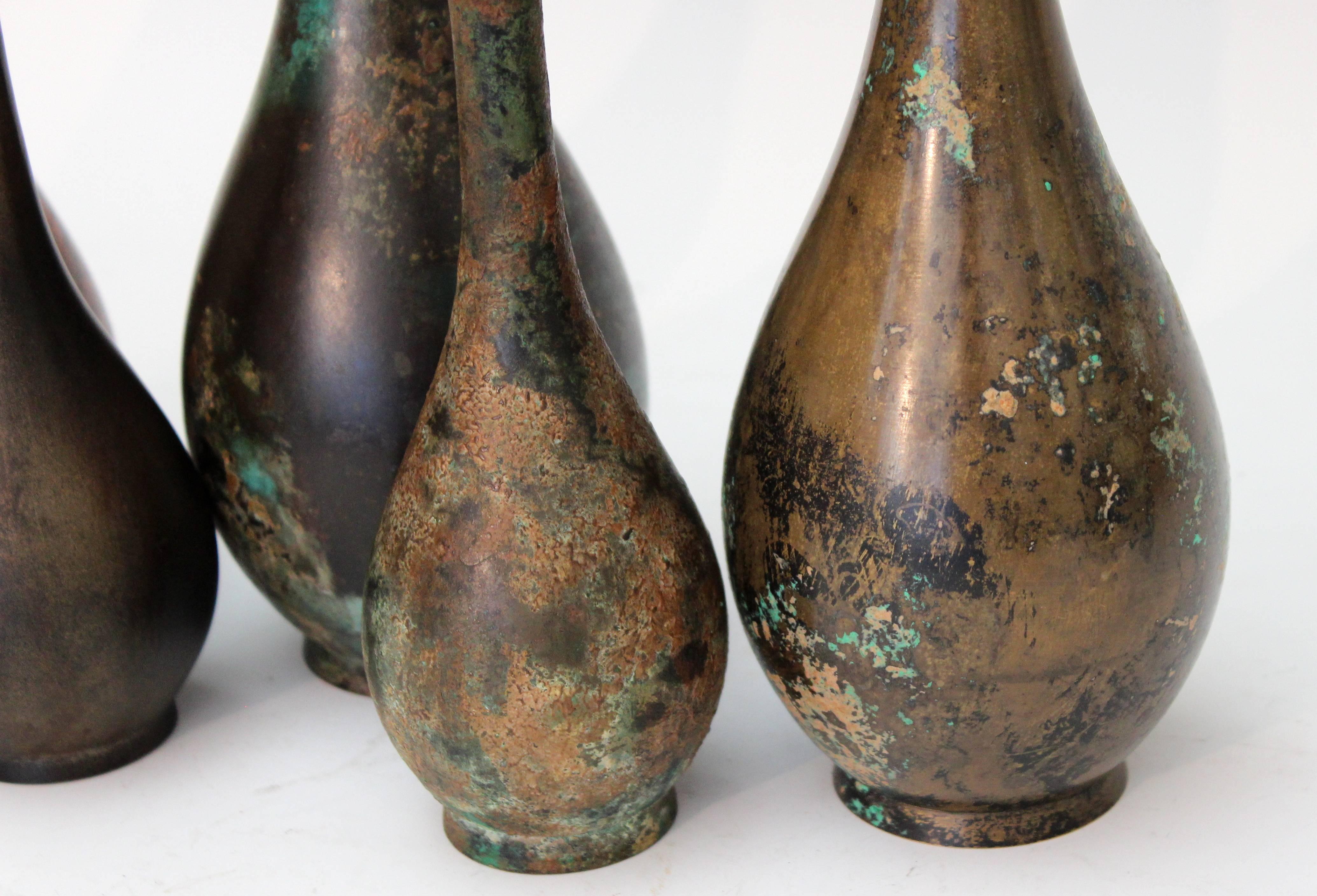 Five vintage Japanese bronze bottle vases with varied applied finishes, circa mid-late 20th century. Measures: 6