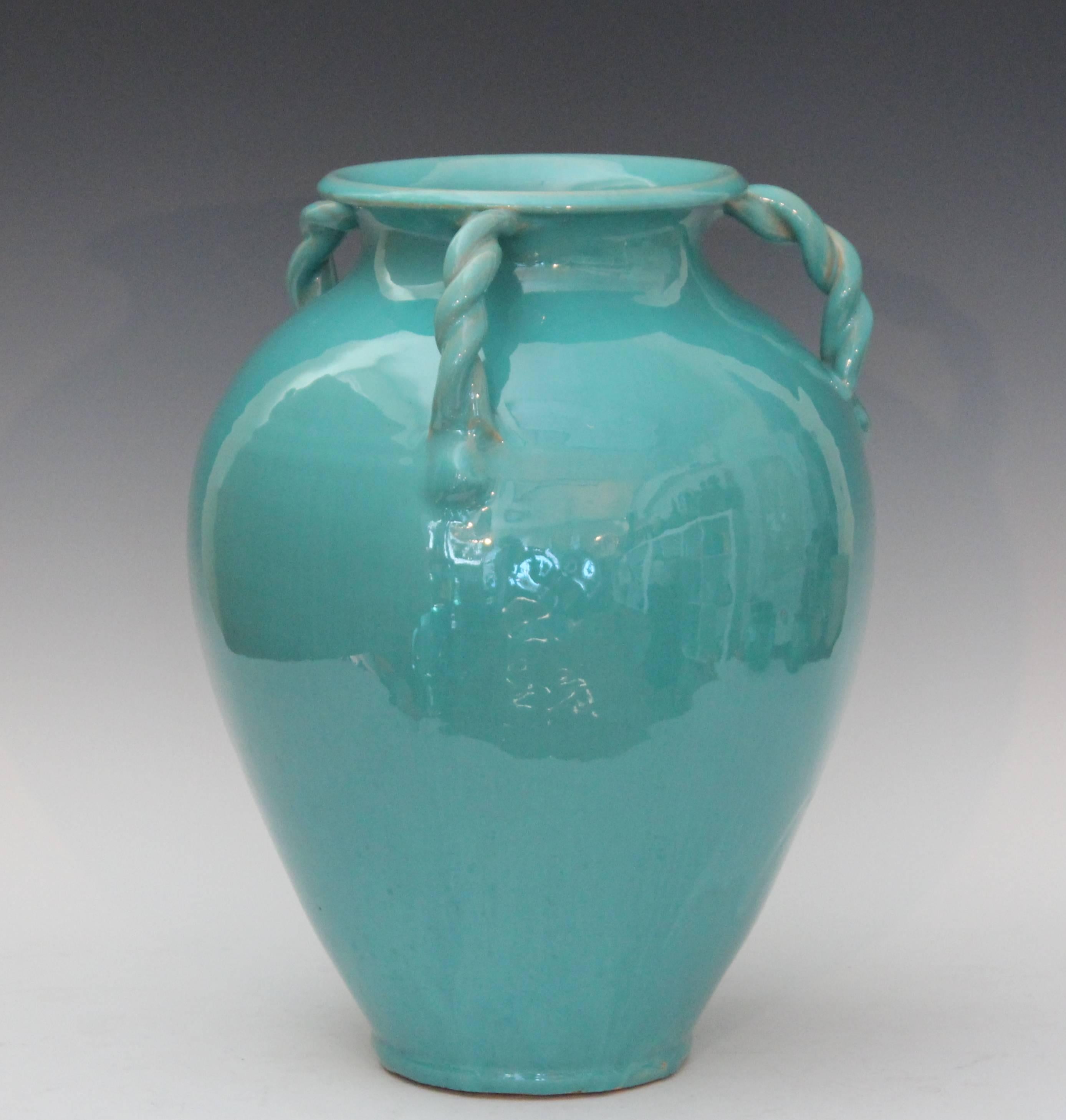 Large Royal Crown vase in turquoise glaze with three rope twist handles, circa 1940. Measures: 13 1/2