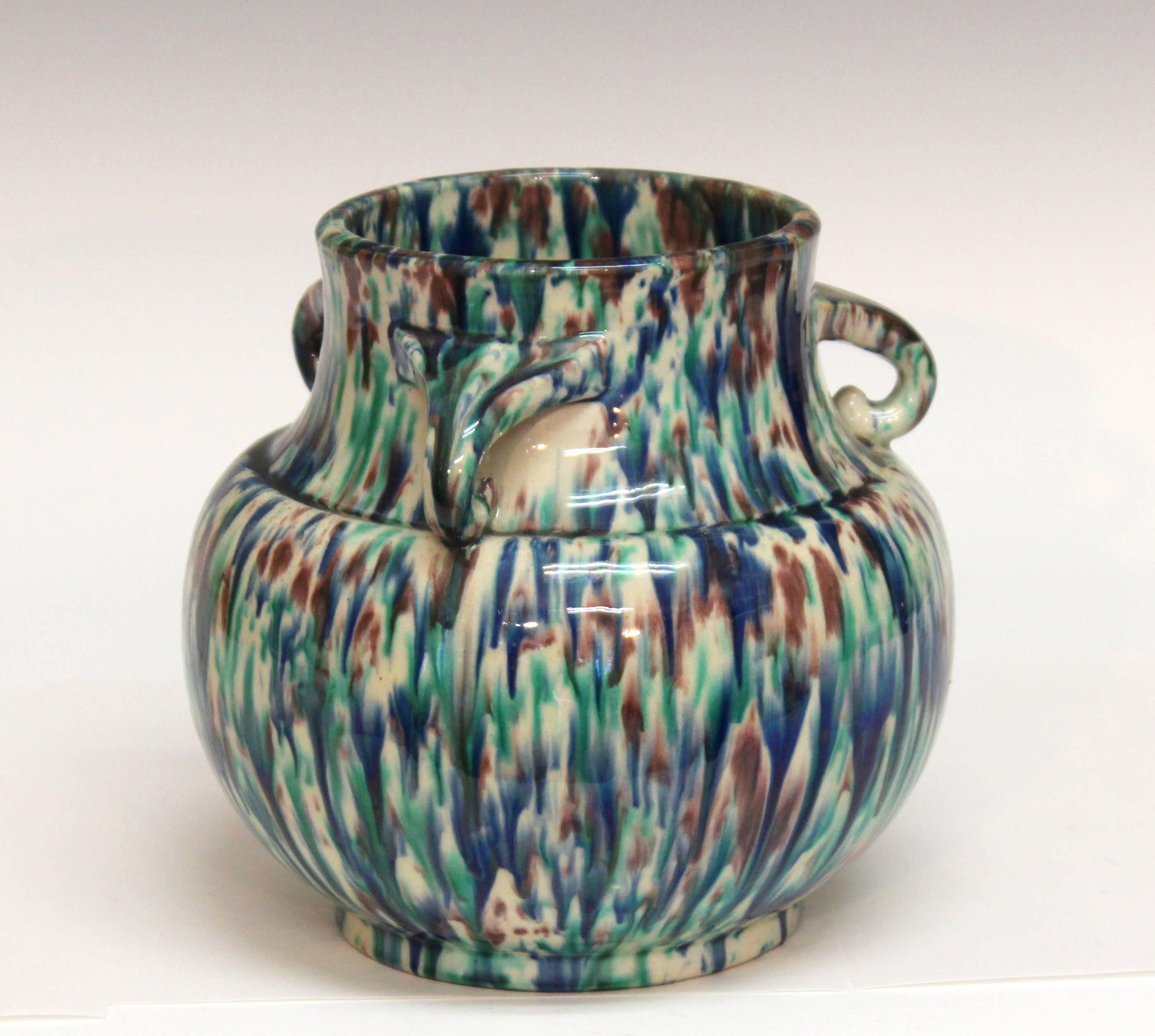 Awaji pottery vase in terrific Art Deco three-handle form with great polychrome flambé drip glaze, circa 1930. Impressed export, kiln and potter's marks. 7