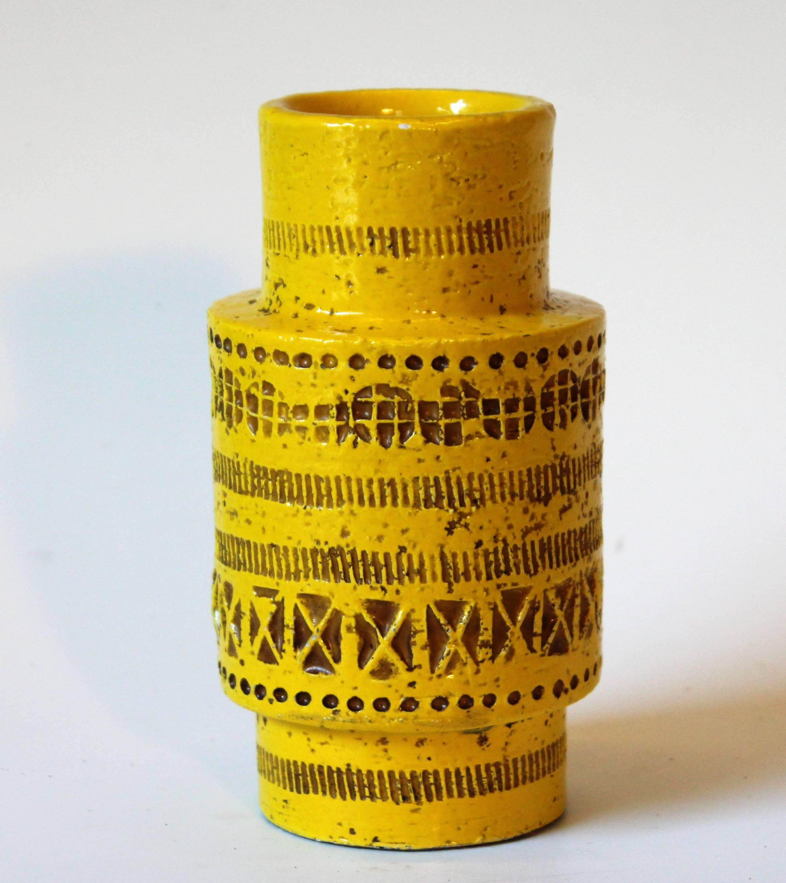 Vintage Bitossi vase with impressed Rimini decor on a sunny yellow ground, circa 1960s. Measures: 6 1/2