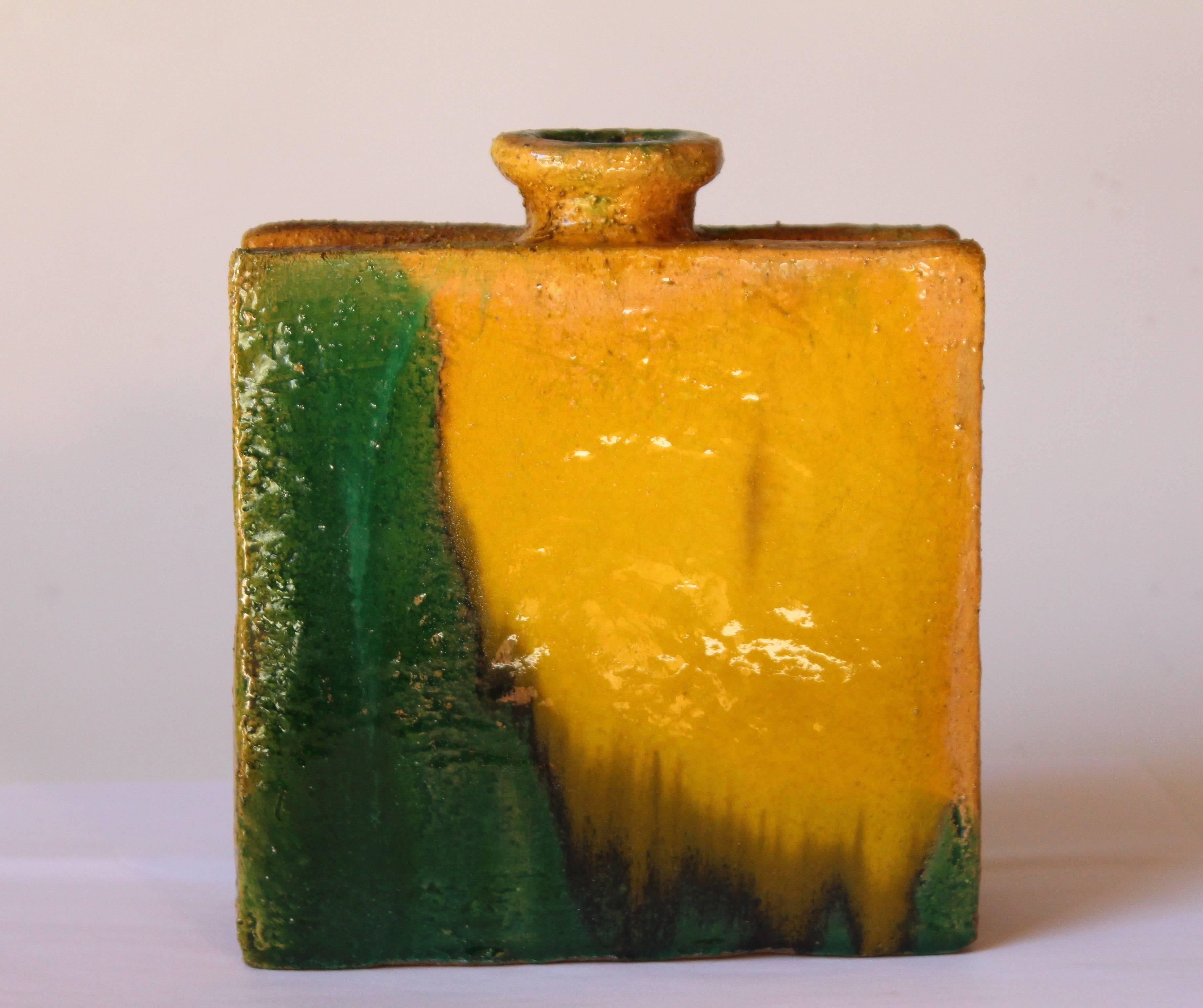 Great, vintage Gli Etrushi (The Etruscans) pottery square vase designed by ceramicist Ivo De Santis, circa 1960s. Terrific boxy masculine form with extraordinary yellow, green, brown flambe glaze. Measures: 7" high, 6" wide, 2 1/2"