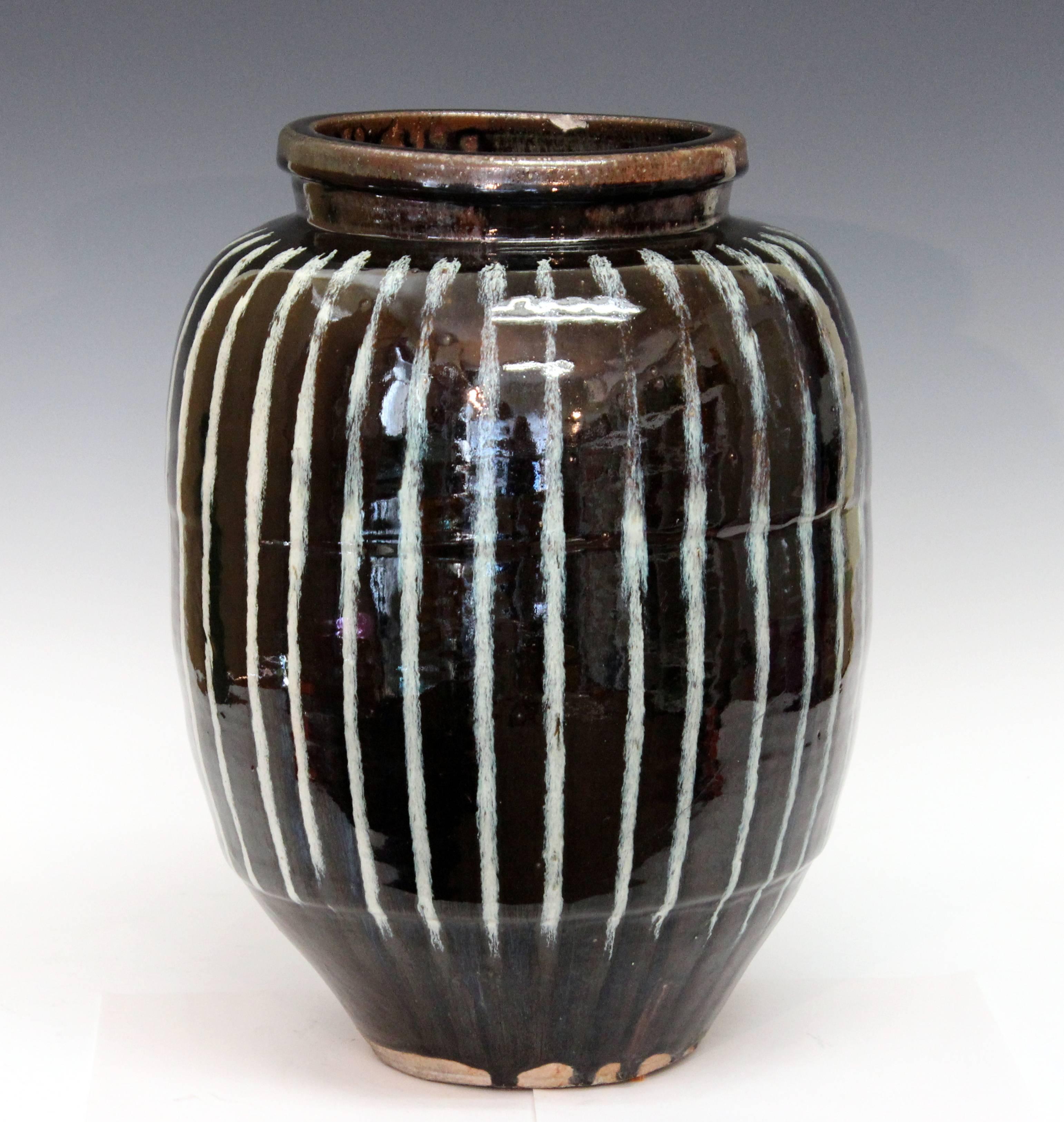 Japanese Shigaraki Valley storage jar with striking white on black vertical stripes design, circa 1900. 16