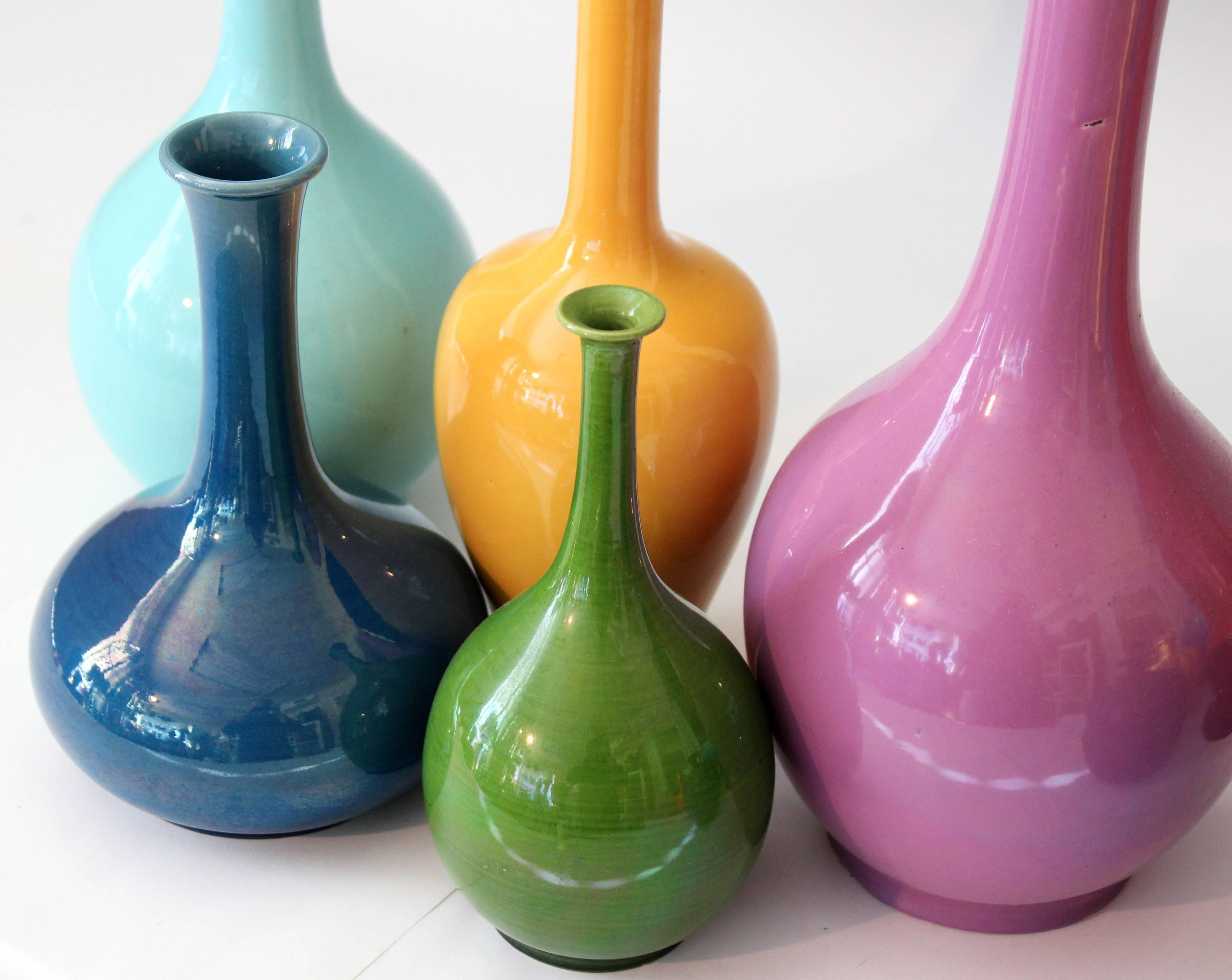 Five Awaji bottle vases in different colored monochrome glazes, circa 1910-1930. Measures: 6