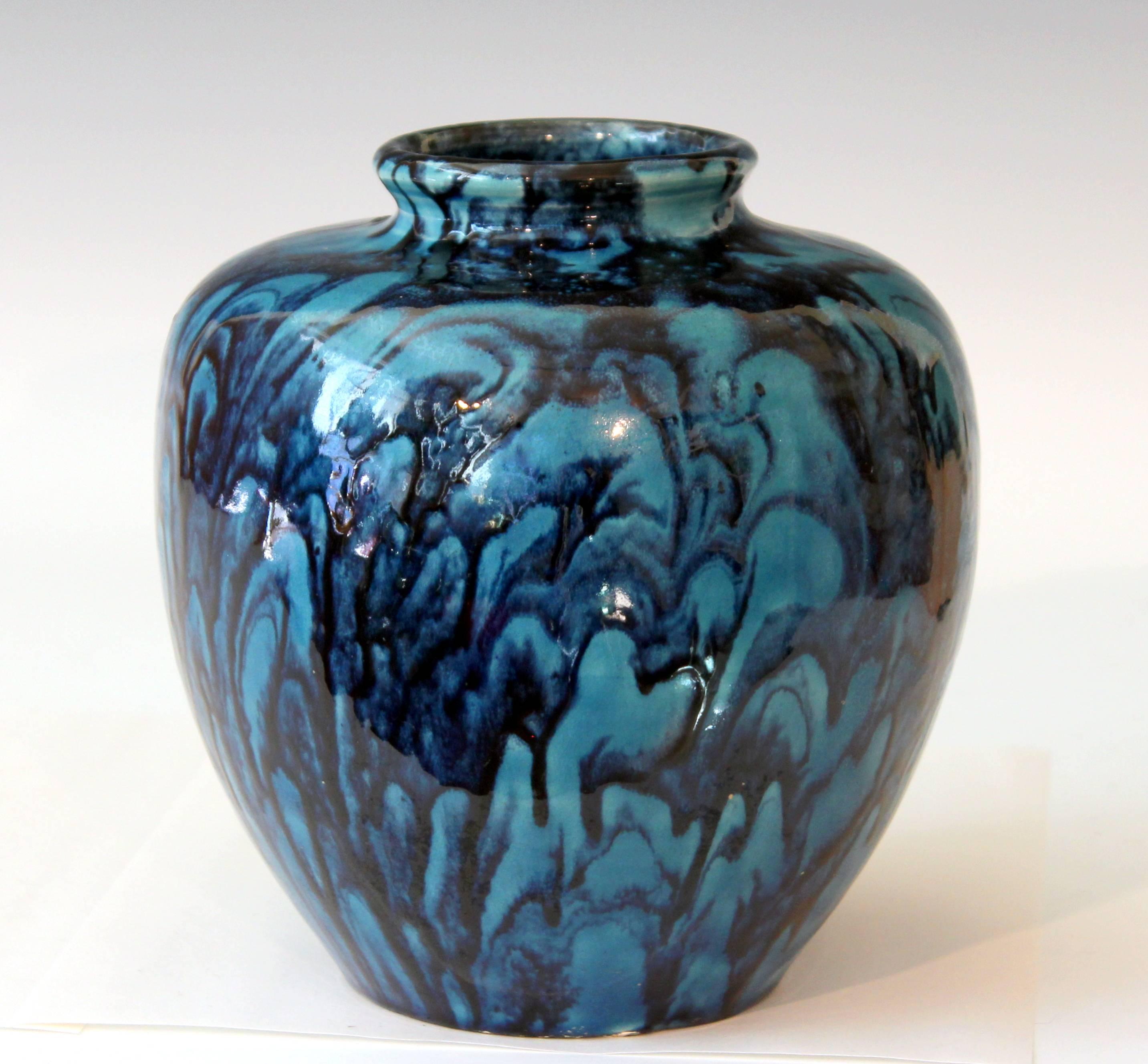 Awaji Pottery vase or jar with dark indigo blue drips over a mottled turquoise ground, circa 1930. Measures: 7 1/2