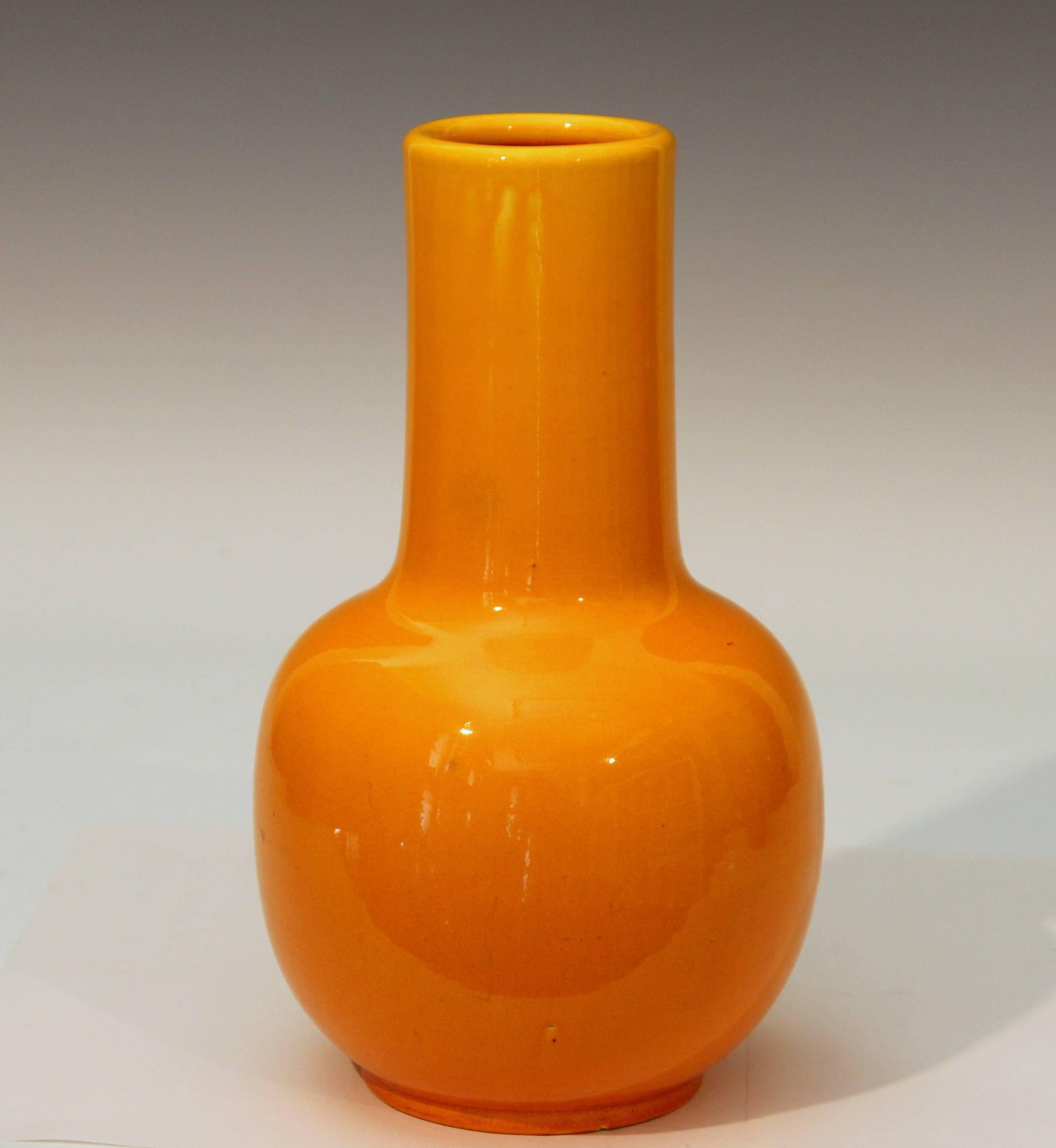 Awaji pottery bottle vase in finely crackled warm yellow glaze, circa 1930. Impressed export mark. Measure: 9 7/8