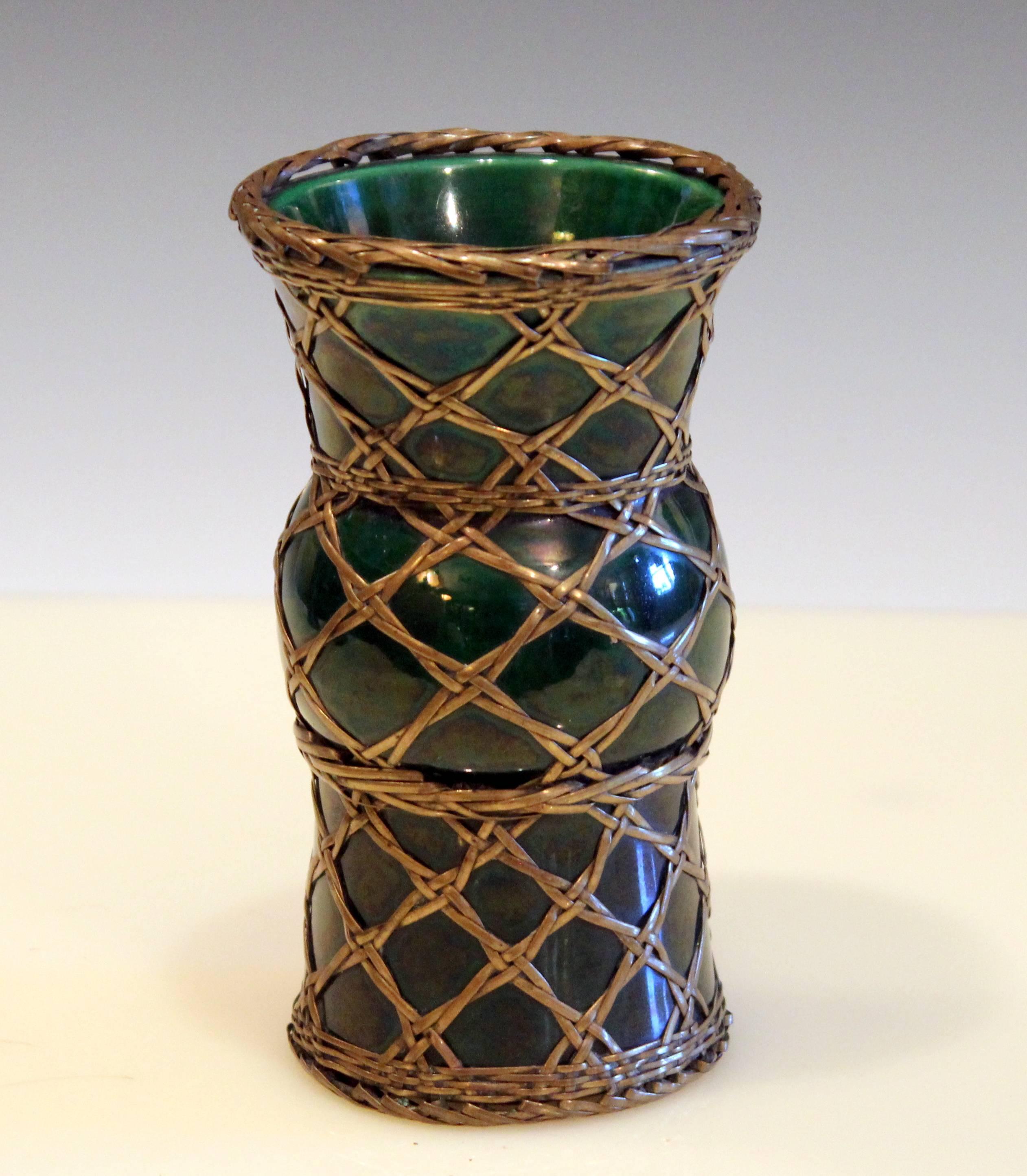 Antique Awaji pottery vase in Gu form with green glaze and brass over weaving, circa 1910. Measure: 6