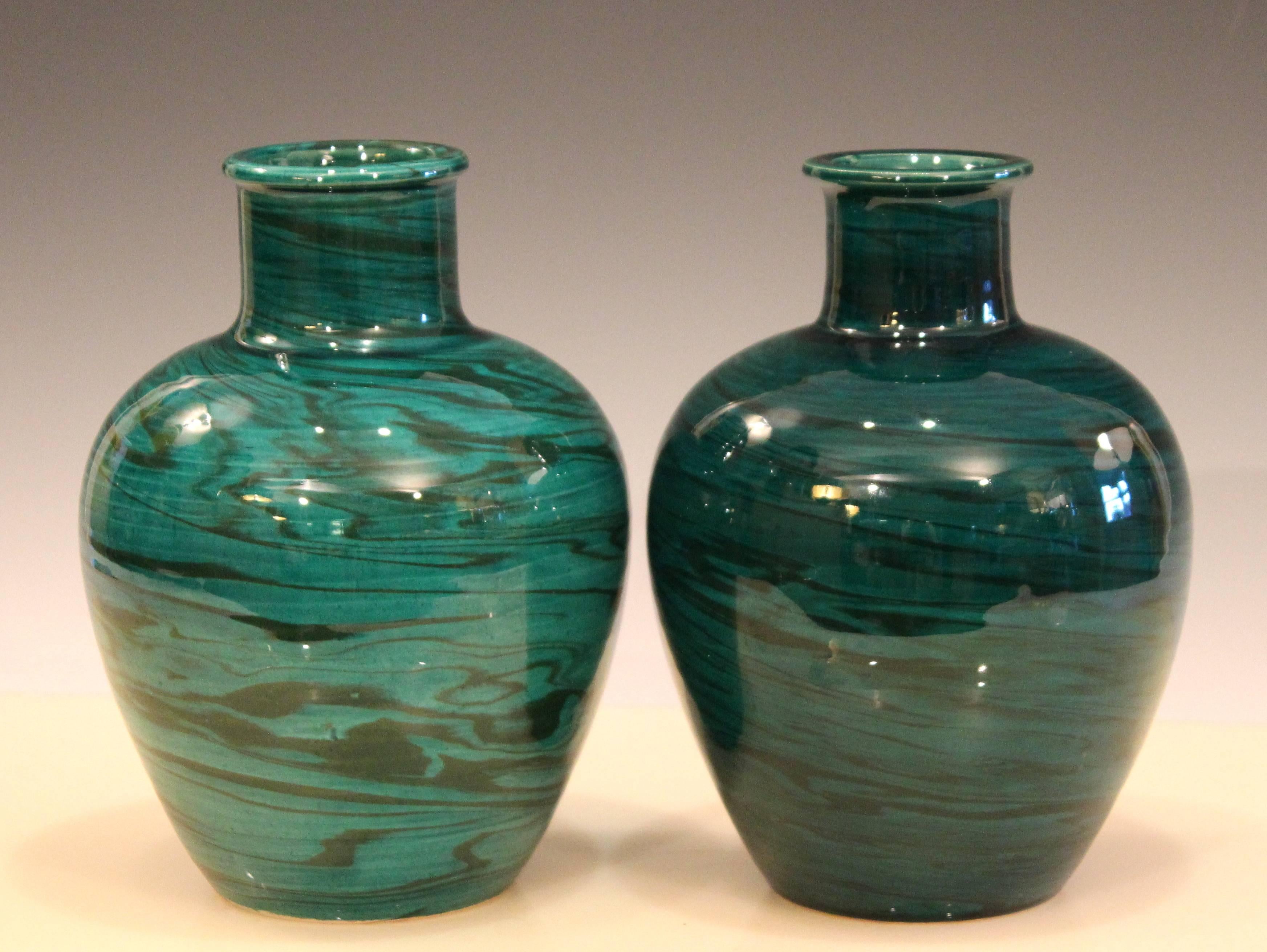 Vintage pair of Bitossi vases in green marbled pattern with good contrasts, circa 1970s. Measures: 8 5/8