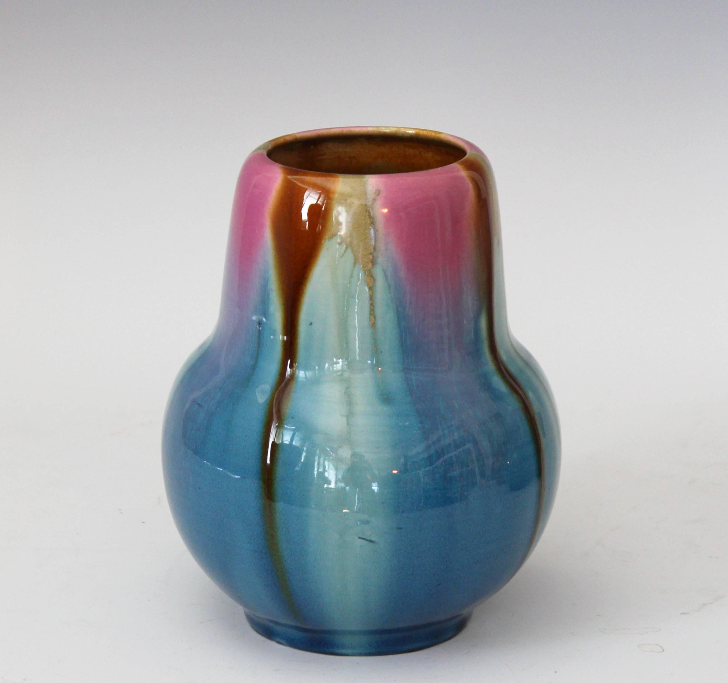 Vintage Awaji vase in organic form with pink, khaki and caramel drip glaze over turquoise, circa 1930. Impressed export and kiln marks. Measures: 7
