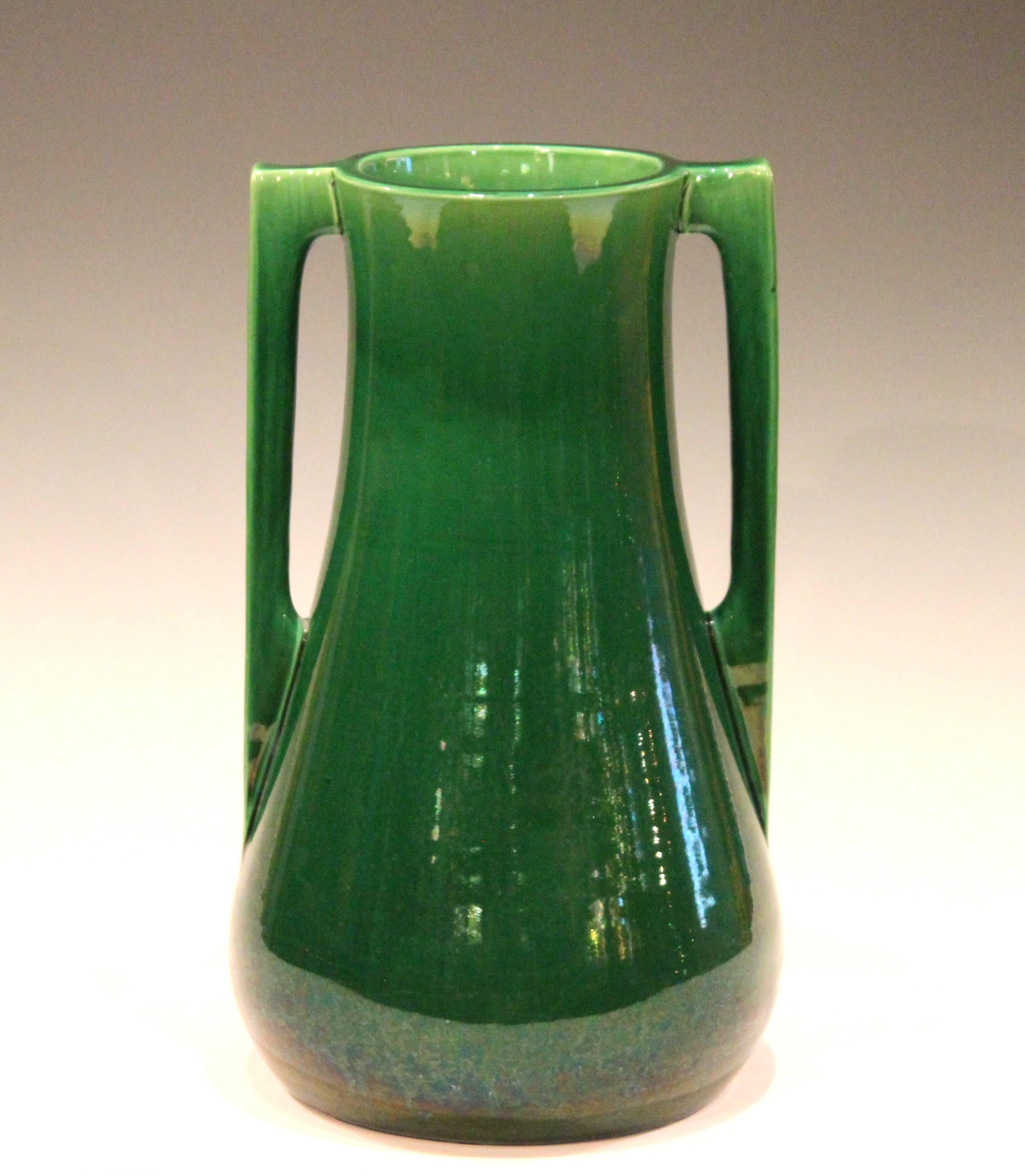 Vintage Awaji vase in terrific architectural form with applied buttress handles and deep green monochrome glaze, circa 1920s. Measures: 12