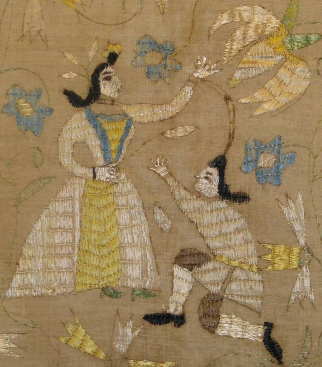A 19th century Portuguese (Castelo Branco) embroidered coverlet made of homespun linen/flax and embroidered in silk floss thread with a central roundel with a boy and girl surrounded by blossoming flowers, scrolling vines, and birds.