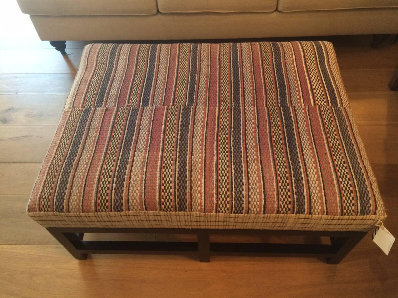 Large Ottoman by Nathan Turner, upholstered with vintage mattress fabric.