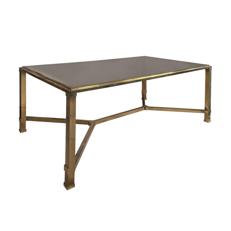1970s Rectangular Brass and Smoked Glass Coffee Table with Brass Stretcher For Sale