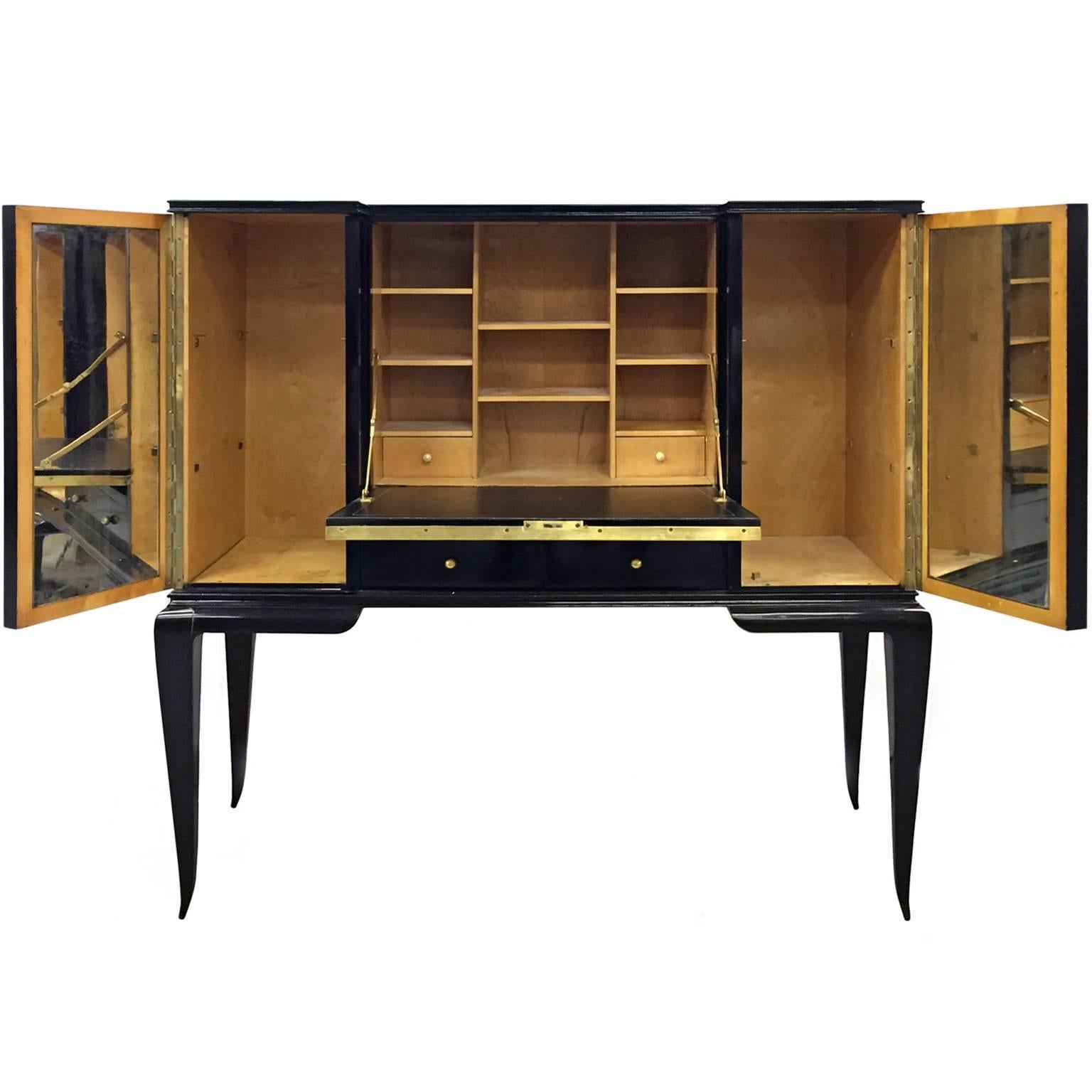 Mid-Century black lacquered wood secretary with central mirrored panel by Decoene. Belgian, 1950s.