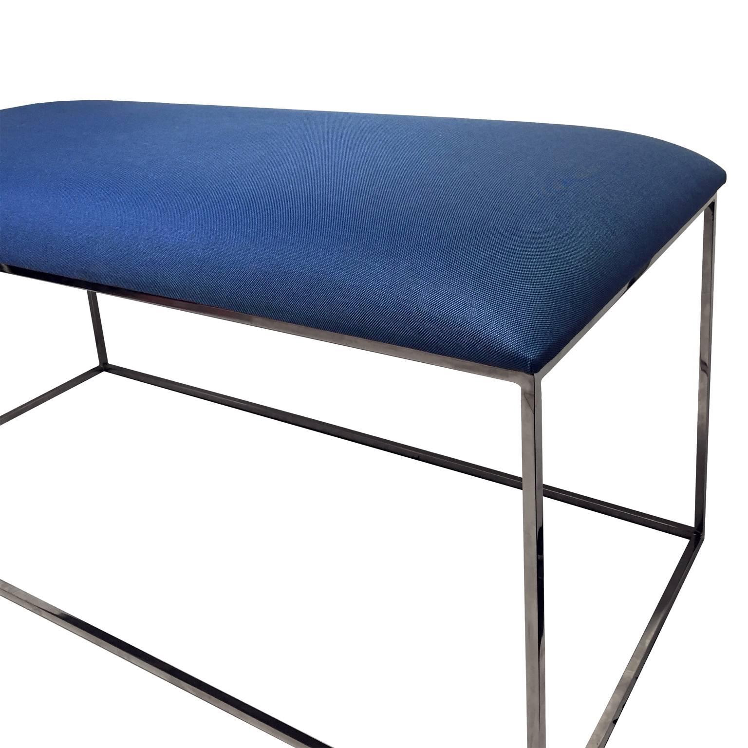 Vintage chrome rectangular base bench with light blue upholstery.