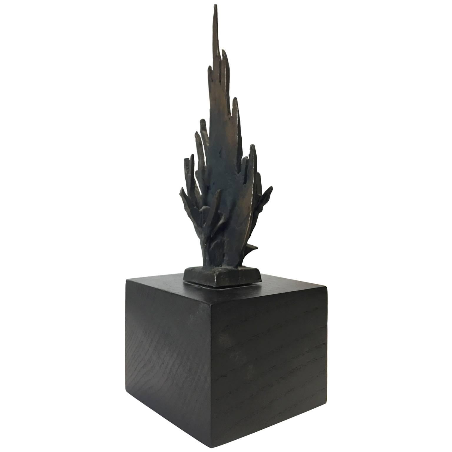 Mid-Century bronze flame sculpture on a ebonized wood plinth by Chaim Gross. USA, 1960's.