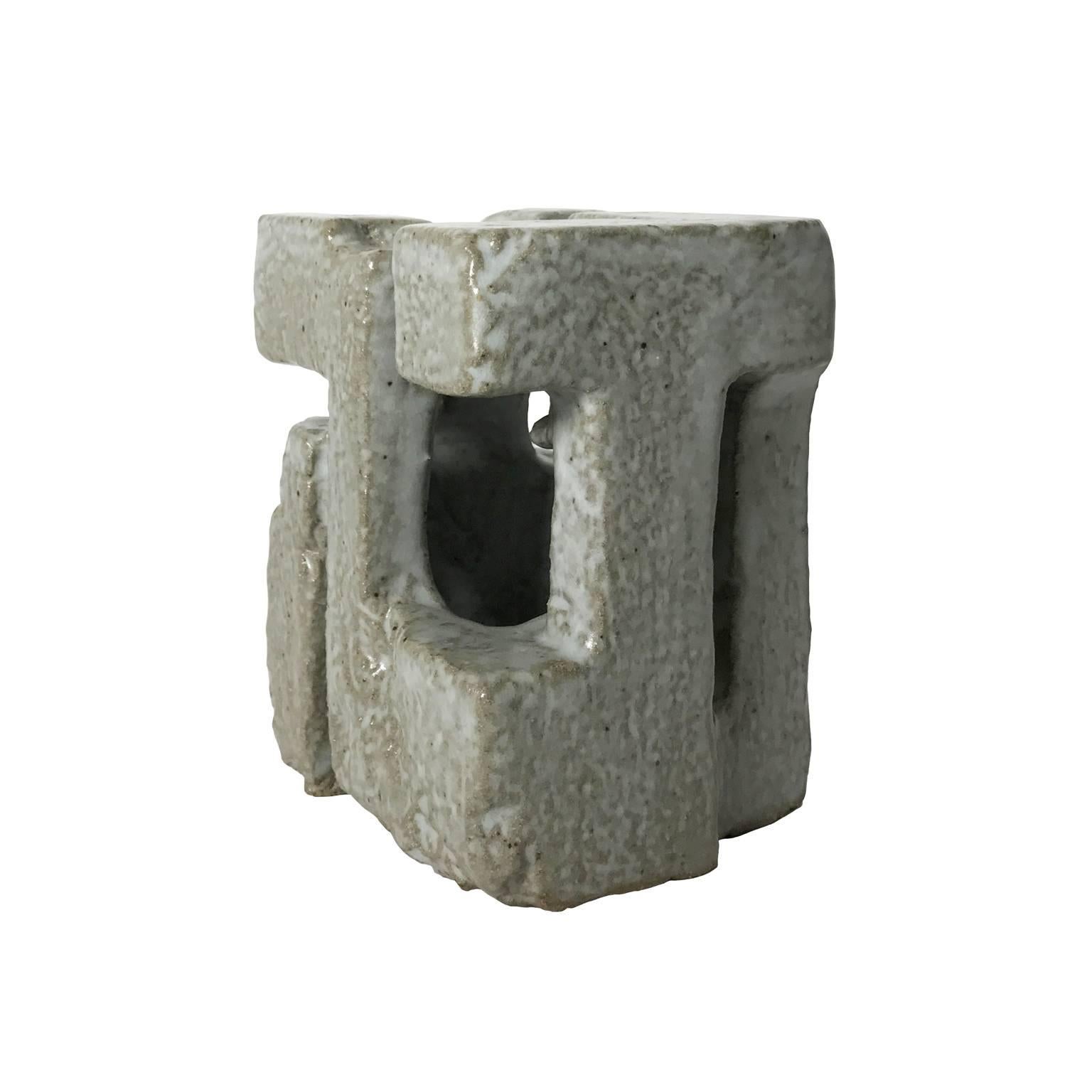 Small 1960's abstract pottery sculpture with grey glaze by Corrine Peterson.