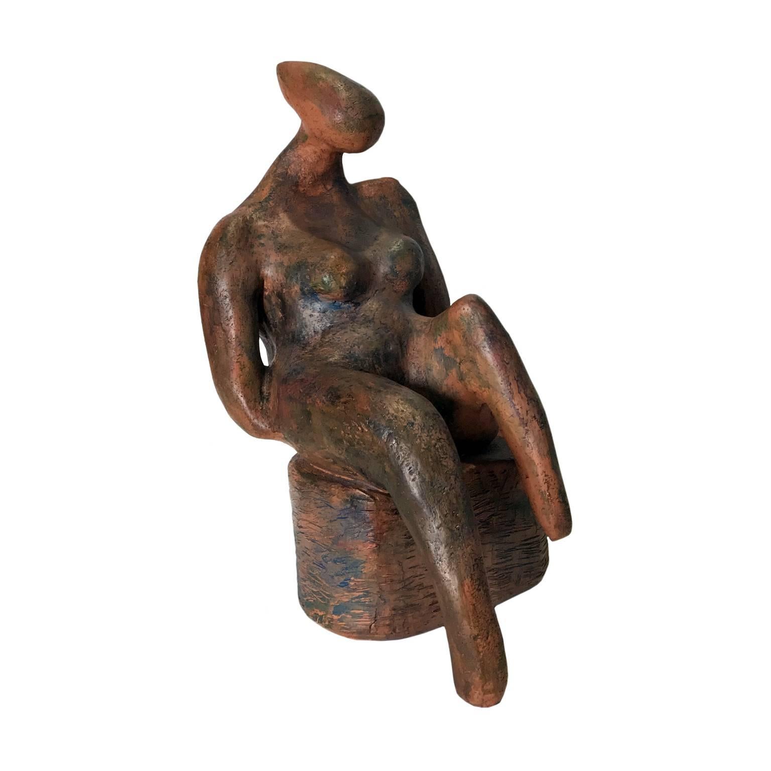 Figurative nude seated female terracotta sculpture. Signed illegibly and dated 1995.