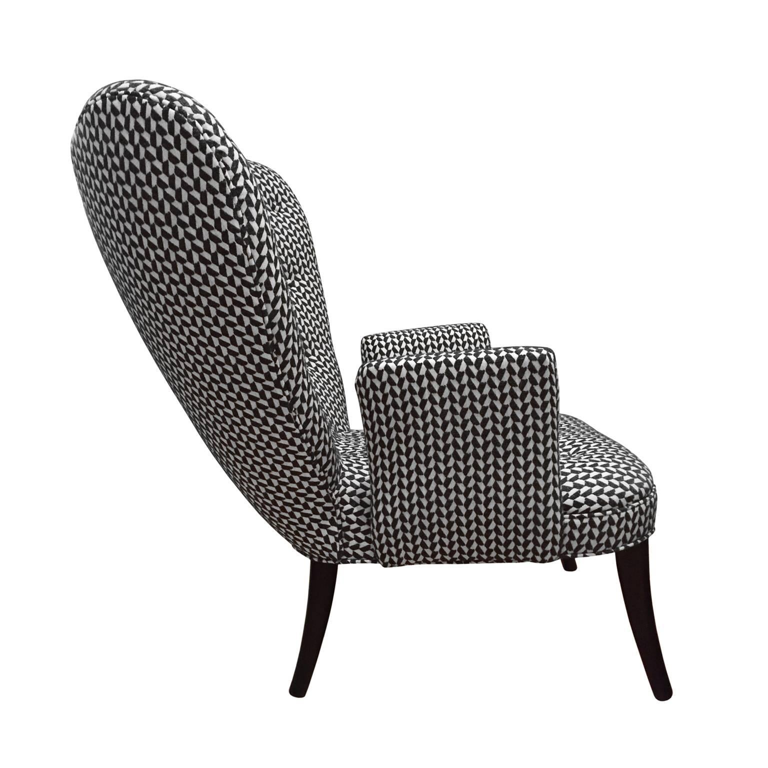 Flair Home collection custom Paolo chair in a black and white textured twill upholstery. Based on the elegant lines of a 1950s Italian armchair.

Pair available, priced individually.