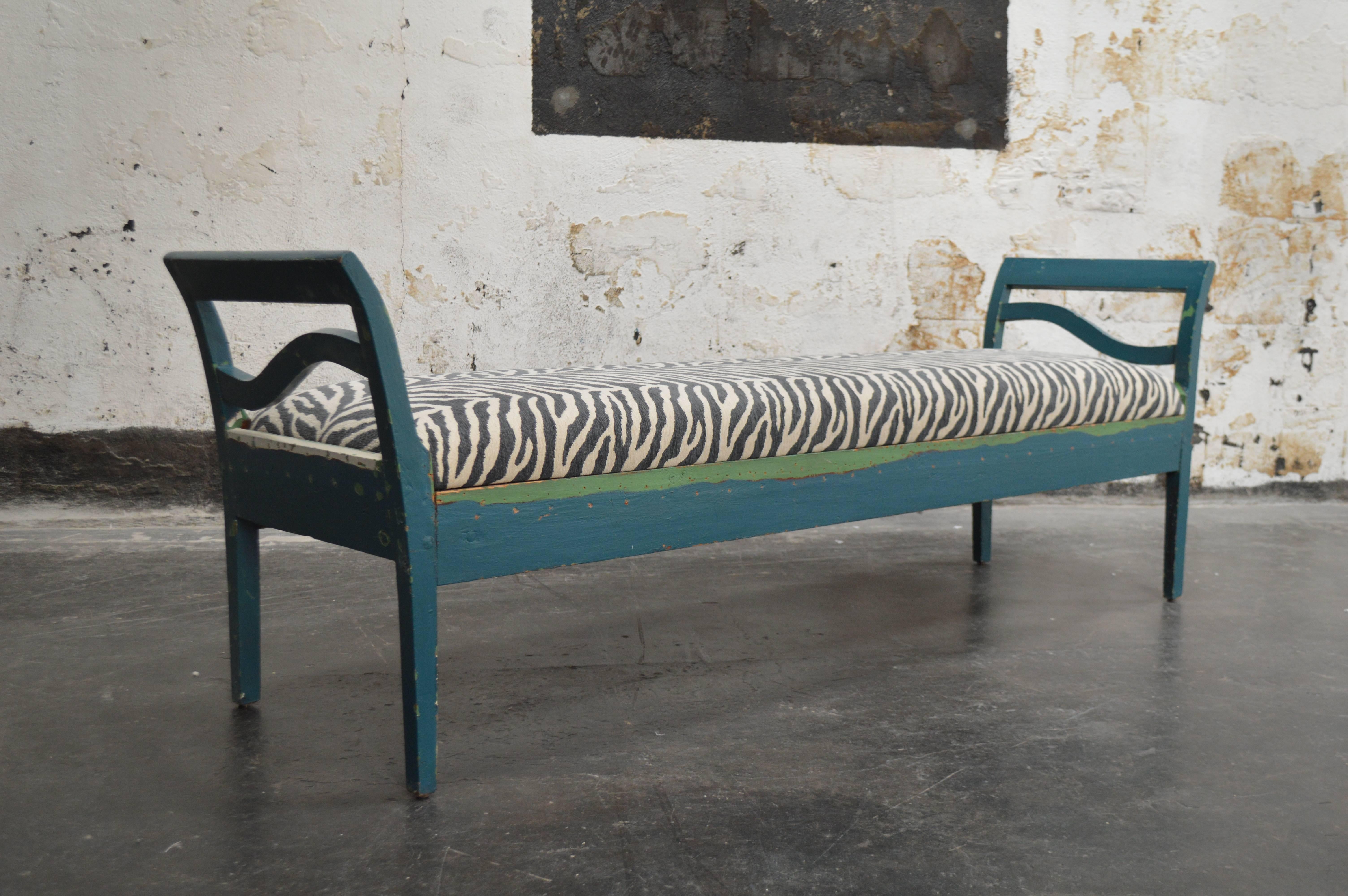 Restored Swedish Country settee, sofa or bench in the Gustavian Style. Probably late 19th century, but possibly earlier. 

 The top layer of teal paint has been partially distressed to reveal other layers of paint colors. All wood has been sealed