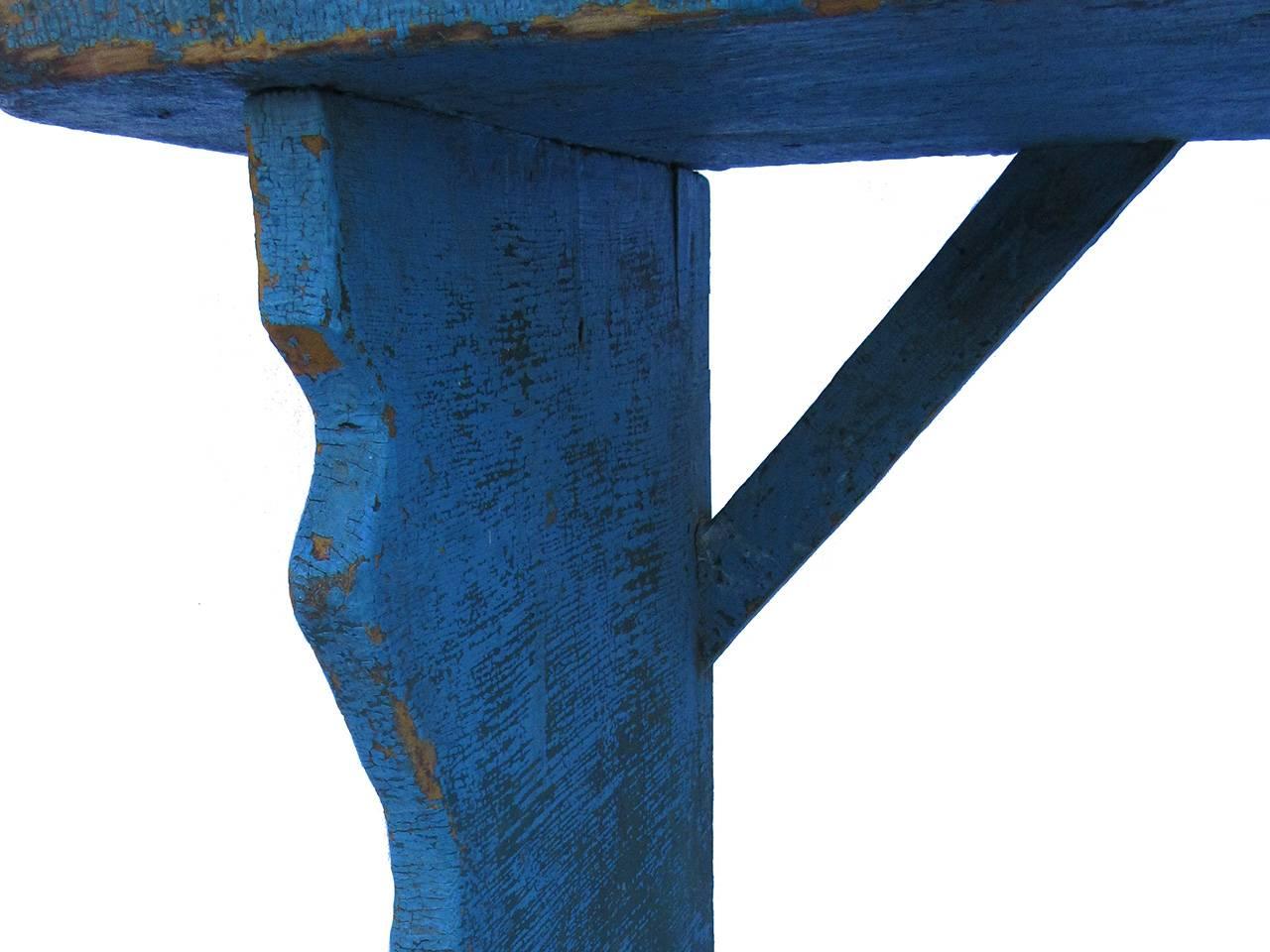 Early 1900 diminutive size bench with cut out side supports in the best blue over mustard surface, excellent condition