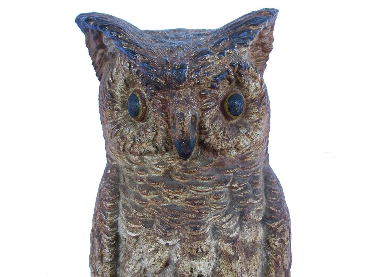 Bradley & Hubbard best in kind cast iron large-scale owl doorstop showing great detail to the casting, exceptional and original age cracked painted surface, original condition, marked B&H on the backside, circa 1900.