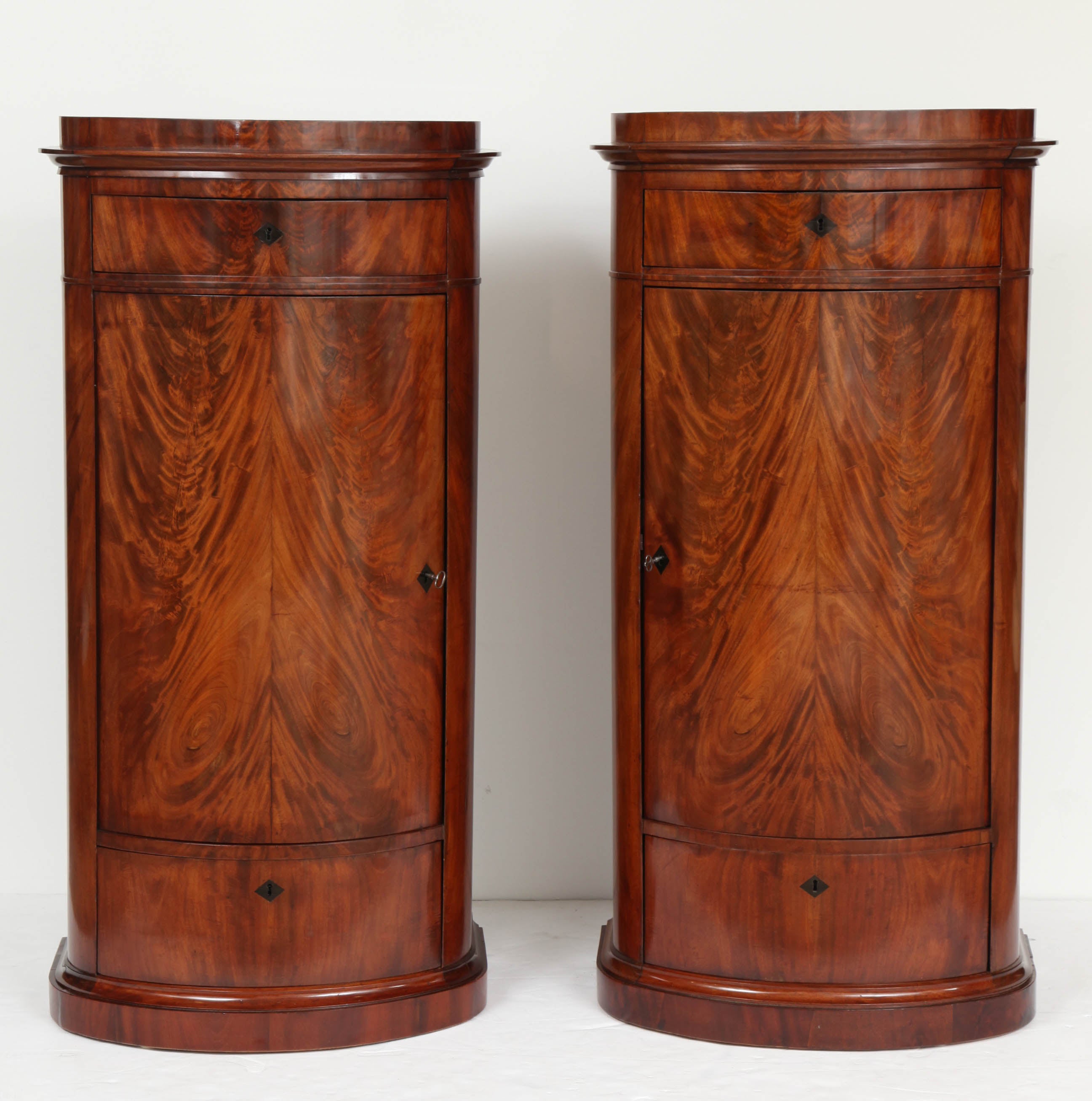 Pair of Danish Empire Oval Pedestal Cabinets