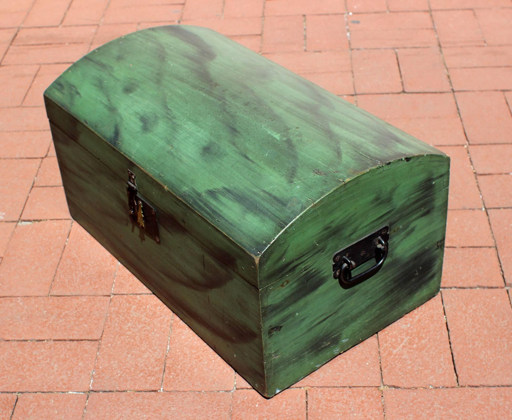 Paint decorated dome-top chest in excellent green and black original paint, decorated on all sides, all original hardware and clean raw interior, pine wood, American, circa 1900.