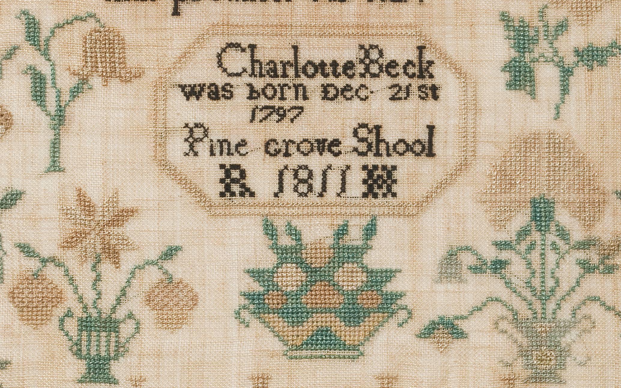 Charlotte Beck worked this excellent sampler while attending the Pine Grove School, a Quaker school near Evesham, Burlington County, New Jersey which first opened its doors in 1792. Interestingly, the sampler includes a depiction of Westtown School