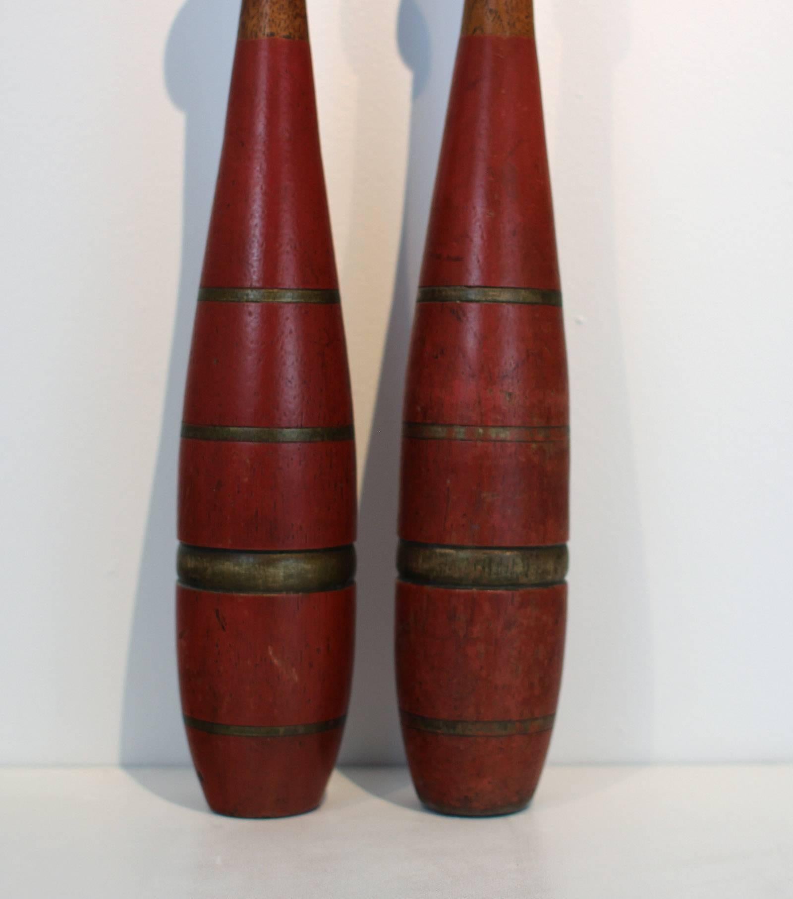 Folk Art Pair of Red Painted Juggling Pins