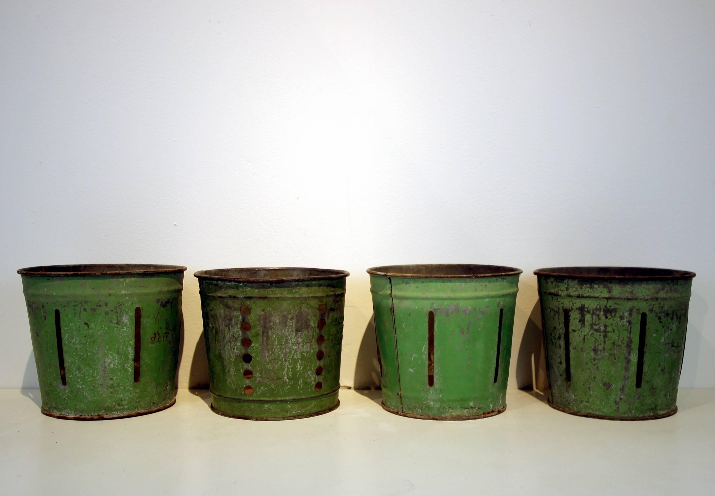 Industrial Set of four Green Painted Metal Bucket Measures For Sale