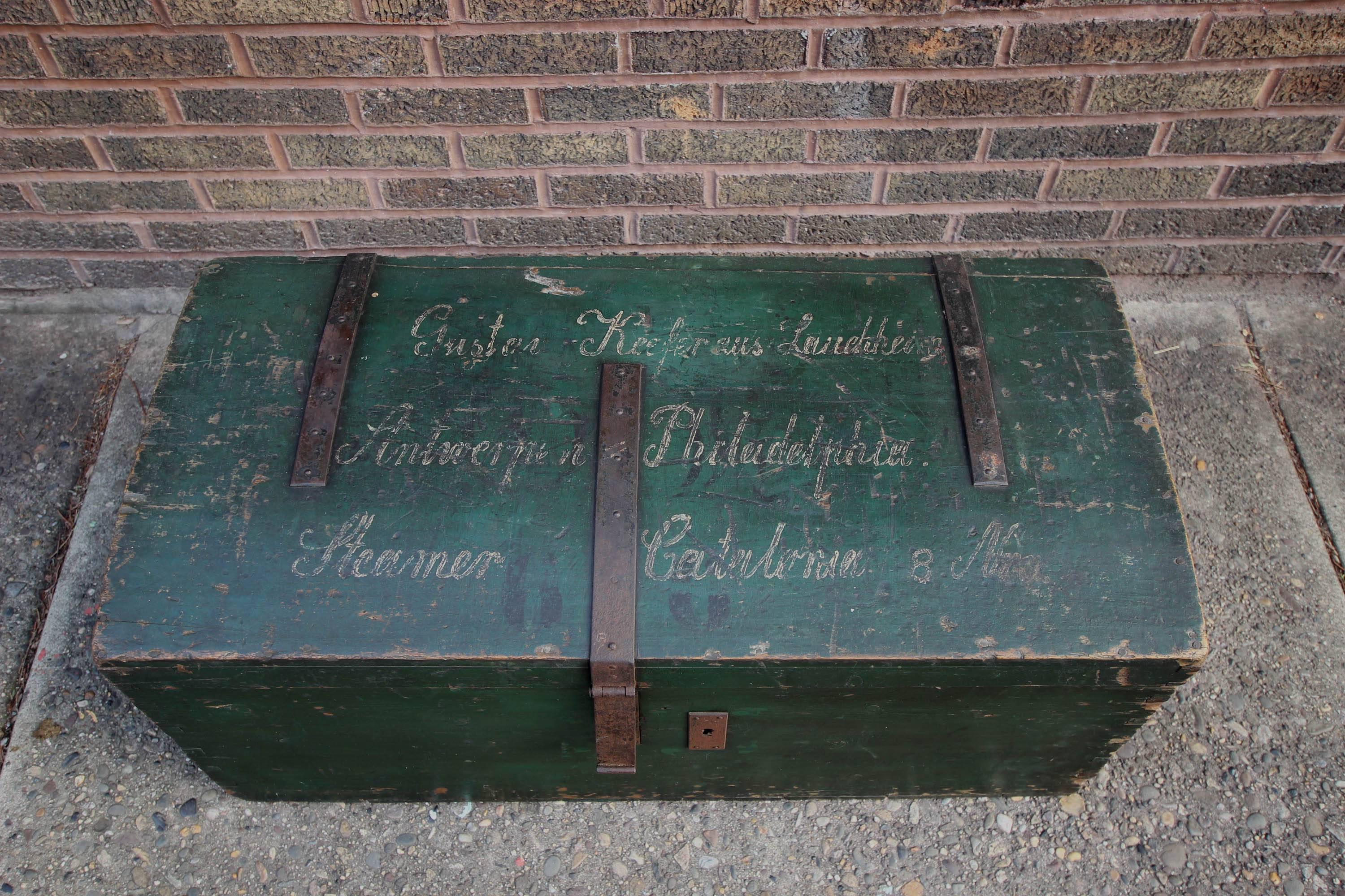 Deep green trunk with excellent, original wrought iron hardware - used for travel from Europe to the United States. Pine wood, dovetail construction; all original.

The top reads: Guston Keefer aus Lauchheim / Antwerp Philadelphia / Steamer